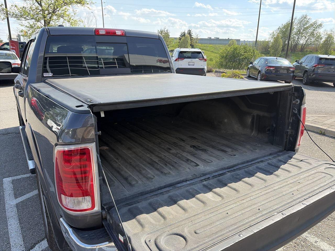 2016 RAM 1500 Laramie V8 HEMI (140.5 WB - 5.7 Box) SOLD AS/IS Photo