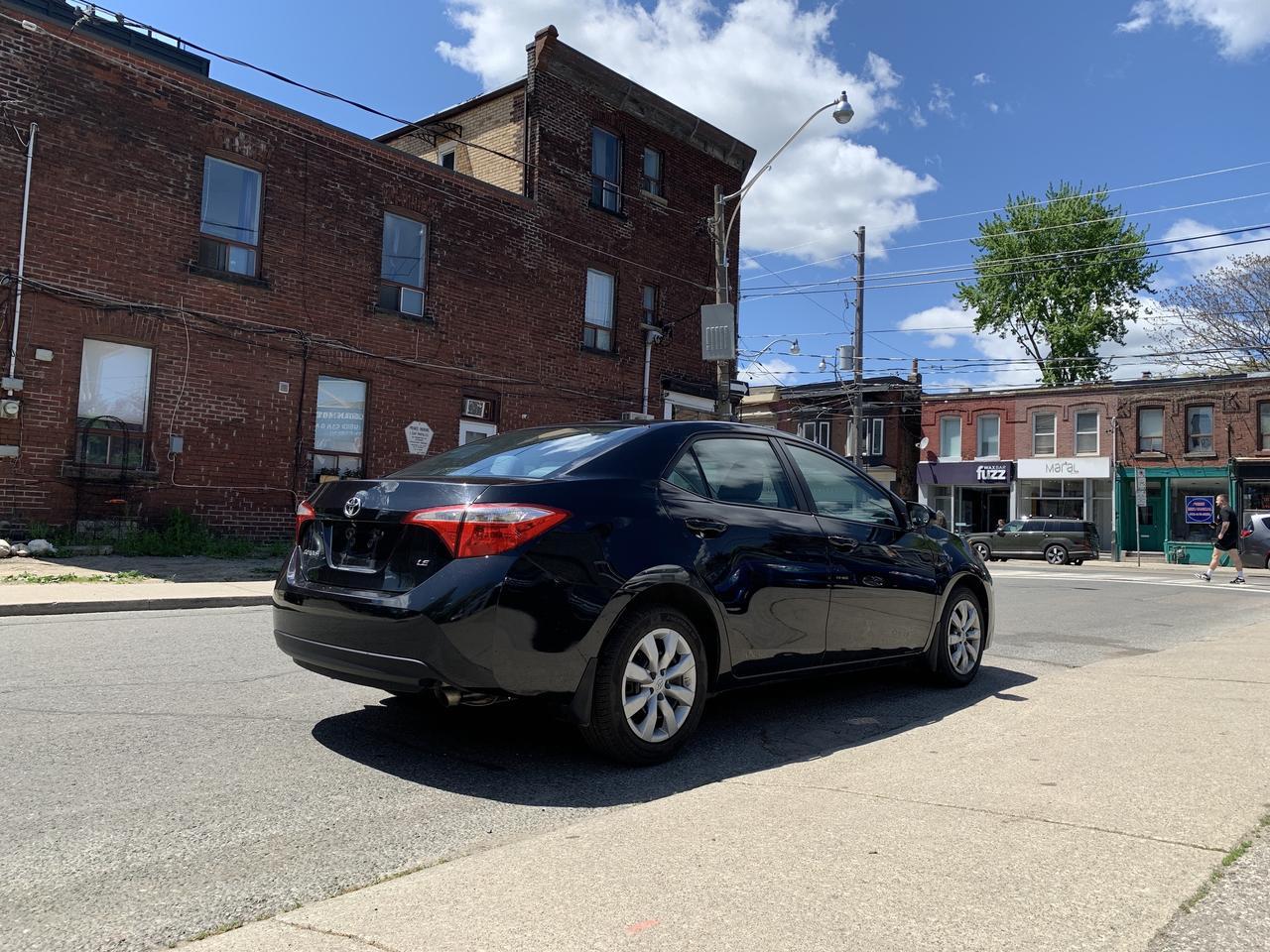 2015 Toyota Corolla 4dr Sdn CVT LE Photo
