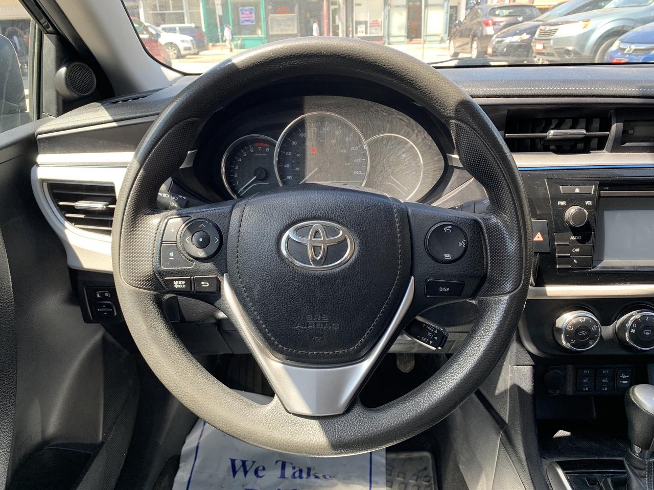2015 Toyota Corolla 4dr Sdn CVT LE Photo