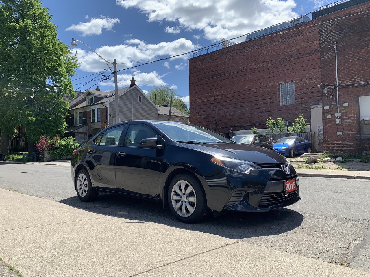 2015 Toyota Corolla 4dr Sdn CVT LE Photo