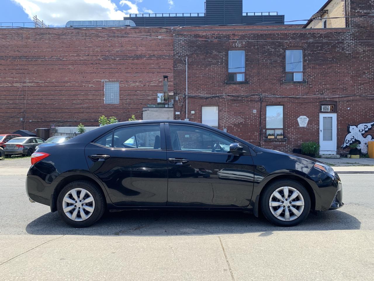2015 Toyota Corolla 4dr Sdn CVT LE Photo