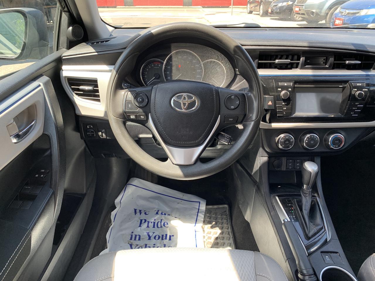 2015 Toyota Corolla 4dr Sdn CVT LE Photo