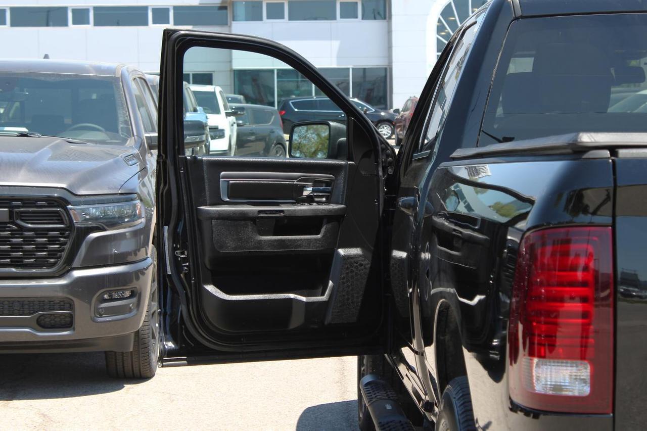 2022 RAM 1500 Classic SLT  SiriusXM SideSteps BedCover RearParkingSensor Photo