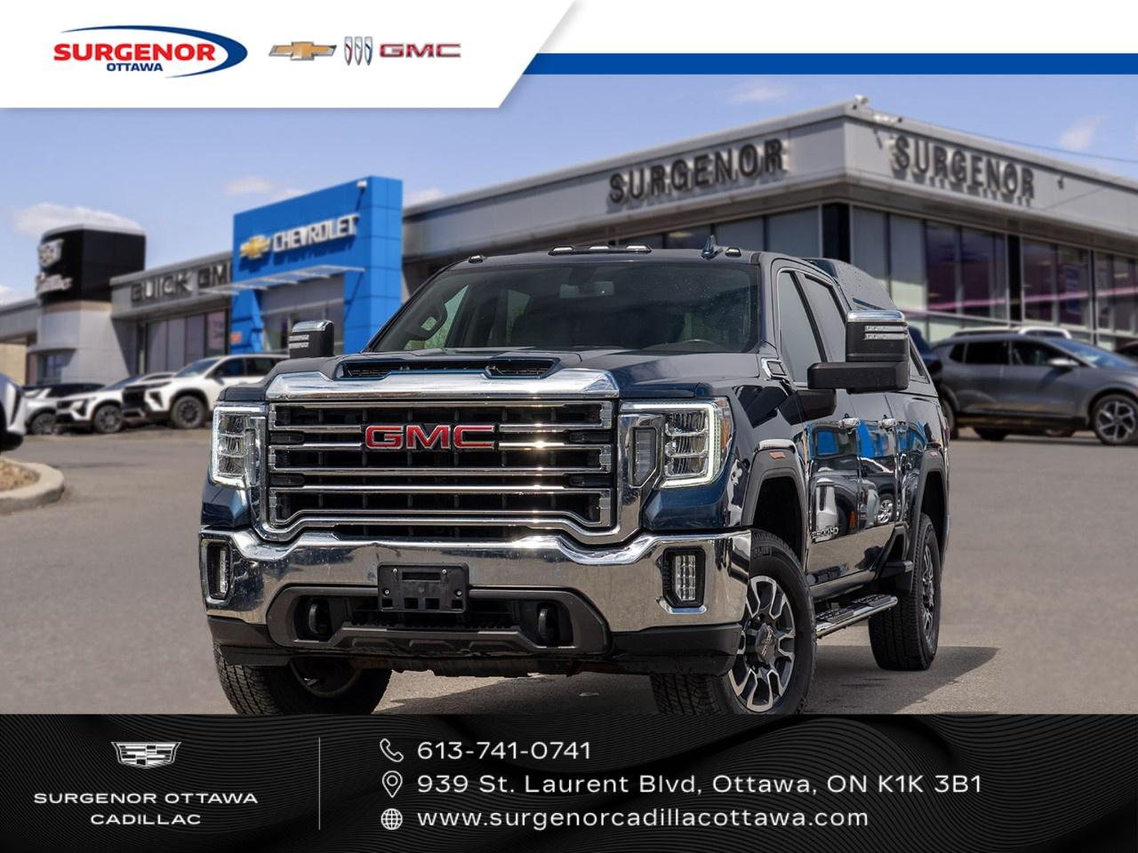<p>The 2021 GMC Sierra 2500HD SLT 4WD Crew Cab Standard Box arrives in a commanding blue color with a robust 4x4 drivetrain, ensuring dependable handling on any terrain. This truck not only boasts power but also style with its alloy wheels and bold stance.</p><p>Step inside to experience the luxurious black leather interior, offering both comfort and modern style. The convenience of leather seats, power windows, and keyless entry enhance your driving experience, while the heated seats and steering wheel add a touch of comfort during those cold Canadian winters.</p><p>Equipped with the latest technology, the Sierra 2500HD features a backup camera for added safety, Bluetooth connectivity, and a premium satellite radio. The smart device integration and Wi-Fi hotspot keep you connected on the go. For peace of mind, the heated mirrors and cruise control provide extra safety and ease.</p><p>This truck is perfect for those who need a reliable and powerful vehicle, whether for work or adventure. Come see the exceptional features in personcontact us at the dealership today to learn more about how this stunning GMC Sierra 2500HD SLT can meet all your driving needs.</p>