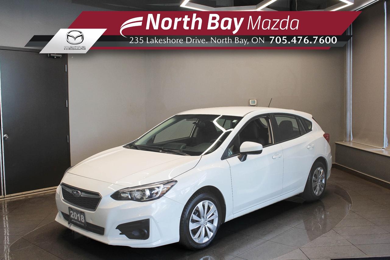 The 2018 Subaru Impreza is a practical and dependable car thats ready for whatever the day has in store. Its standard all-wheel drive system provides added confidence through changing weather and road conditions, while the comfortable cabin and smooth ride make it easy to live with every day. FEATURES: All-Wheel Drive, heated front seats, backup camera, Bluetooth connectivity, touchscreen infotainment system, steering wheel audio controls, cruise control, power windows and locks, USB connectivity, air conditioning, split-folding rear seats. 

Why Youll Want to Buy from North Bay Mazda? *The Clubhouse Commitment Pre-Owned Vehicle Program provides you with additional coverage for things such as the 3-year Tire and Rim Coverage, The Clubhouse Powertrain Warranty, coverage for The Little Things like battery, wiper, and bulb replacement, 3- year anti-theft protection to give you the ultimate peace of mind when purchasing a pre-owned vehicle. Clubhouse Commitment is an optional coverage which 
can be purchased at time of sale for a $699 value. Pre-Owned Vehicle purchases are subject to 
an adjusted price when purchasing with cash. You are eligible for Finance Pricing with a maximum down payment of 15% of listed finance price. Contact us for more details. * Our certified vehicles go through a 120-point Clubhouse Certified Used Vehicle Inspection, and we will provide the CarFax vehicle history documents as well as any available service history. * We competitively price our vehicles below the market average which means that we have already done all the market research for you. Rest assured that you are getting the best deal possible. * We have automotive financial experts who are experienced in dealing with all levels of credit challenges. We also work with all major banks and third-party lenders daily so we are confident that we can get you the best rate available. * As a premier New and Pre-Owned vehicle 
dealership, we pride ourselves on a superior customer experience and a lifetime of customer care. We are conveniently located at 235 Lakeshore Drive, in North Bay, Ontario. If you cant make it to us, we can accommodate you! Call us today at 705-476-7600 to come in and see this vehicle!