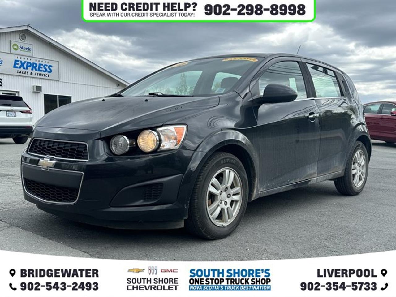 Recent Arrival! Granite 2013 Chevrolet Sonic LT For Sale, Bridgewater FWD 6-Speed Automatic 1.8L 4-Cylinder MPI DOHC 4 Speakers, Air Conditioning, Alloy wheels, Brake assist, Bumpers: body-colour, CD player, Compass, Delay-off headlights, Driver door bin, Dual front impact airbags, Electronic Stability Control, Front anti-roll bar, Fully automatic headlights, Heated door mirrors, Illuminated entry, Outside temperature display, Passenger vanity mirror, Power door mirrors, Power steering, Power windows, Radio data system, Rear window defroster, Rear window wiper, Remote keyless entry, Security system, Speed control, Split folding rear seat, Tachometer, Telescoping steering wheel, Tilt steering wheel, Trip computer, Variably intermittent wipers.