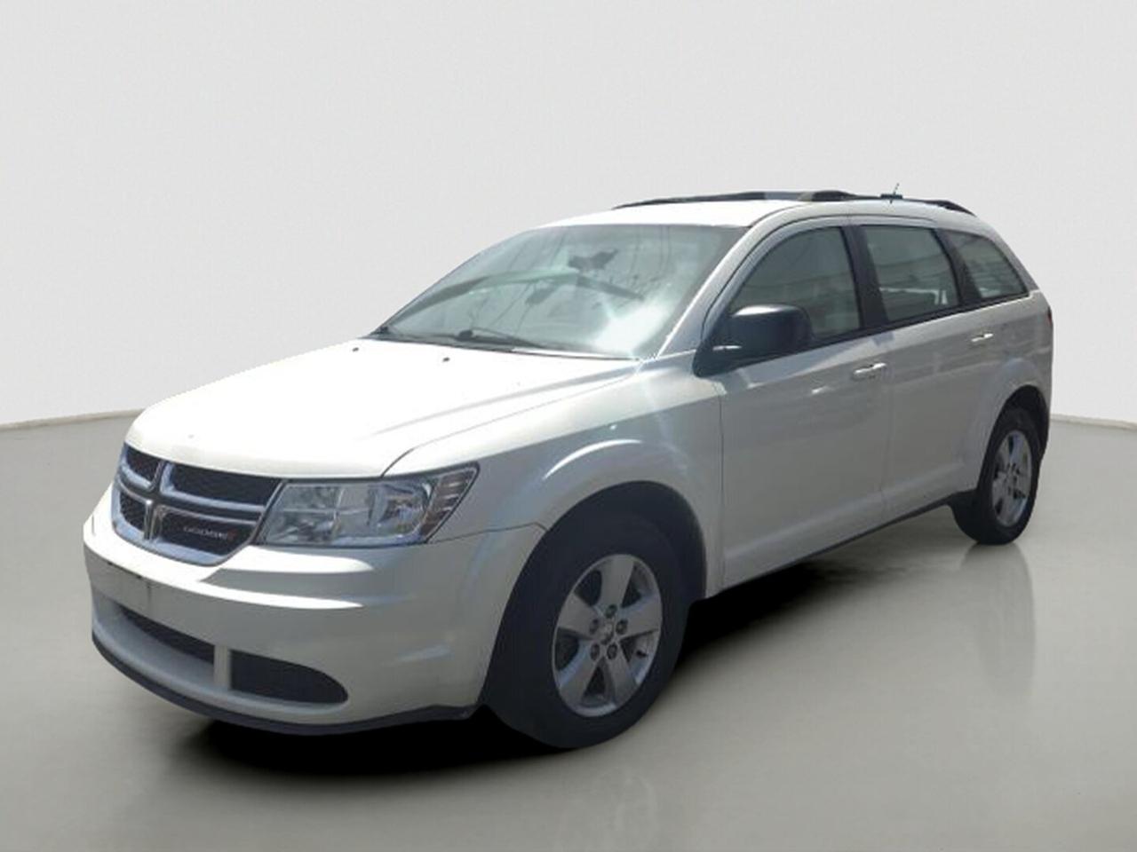 Discover practical value and family-friendly versatility in this 2015 Dodge Journey Cvp / Se Plus, now offered by Peterborough Kia in Peterborough. Finished in white with an automatic transmission, this used SUV has 109,000 km and delivers the flexible space and everyday comfort many Canadian drivers want.

The 2015 Dodge Journey Cvp / Se Plus is a smart fit for commuting, errands, and weekend travel. Its straightforward design, easy driving manners, and roomy cabin make it a great choice for drivers who want useful capability without added complexity. This SUV focuses on the essentials that matter most.

FEATURES OF THE Journey Cvp / Se Plus

»» Automatic transmission for easy daily driving
»» Front-wheel drive for confident road manners
»» Four-door SUV with versatile cabin layout
»» White exterior with clean classic look

ADVANCED SAFETY FEATURES

»» Electronic stability control helps maintain direction
»» Advanced multistage front airbags for protection
»» Child seat anchors for rear seating
»» Four-wheel anti-lock disc braking system

PERFORMANCE AND EFFICIENCY

»» Automatic transmission supports smooth city driving
»» Front-wheel drive balances traction and efficiency
»» Responsive handling for everyday road confidence
»» Practical power for commuting and travel

COMFORT AND CONVENIENCE

»» Spacious cabin designed for family use
»» Four doors allow easy passenger access
»» Rear seats fold for added utility
»» Simple controls support easy everyday use

TECHNOLOGY AND CONNECTIVITY

»» Clear instrument layout for quick reading
»» Easy-to-reach controls improve daily operation
»» Audio system supports in-cabin entertainment
»» Multiple storage areas add everyday usefulness

CARGO SPACE

»» Large rear cargo area for gear
»» Fold-flat seating expands carrying flexibility
»» Room for groceries luggage and supplies
»» Practical layout supports active family life

AWARDS & RECOGNITIONS

»» Top Safety Pick, Insurance Institute for Highway Safety, 2015

WHAT OTHER OWNERS LIKE

»» Flexible interior for passengers and cargo
»» Comfortable ride during daily commuting
»» Easy entry and exit for families
»» Useful value for everyday driving needs

This 2015 Dodge Journey Cvp / Se Plus stands out with its balanced approach to utility, comfort, and affordability. The cabin is designed to handle day-to-day life with ease, whether you are loading shopping bags, packing for a road trip, or driving the family across town.

The white exterior gives this 2015 Dodge Journey Cvp / Se Plus a clean and timeless appearance that suits any setting. Its SUV shape provides the elevated view many drivers enjoy, while the automatic transmission helps keep every trip relaxed and simple, especially in busy traffic or changing weather.

For drivers shopping for a dependable used SUV, this 2015 Dodge Journey Cvp / Se Plus offers practical ownership appeal. With 109,000 km, it has the space, convenience, and straightforward functionality that continue to make the Journey a popular choice for drivers who need versatility at a sensible price.

This 2015 Dodge Journey Cvp / Se Pluss VIN is: 3C4PDCAB8FT595423 .