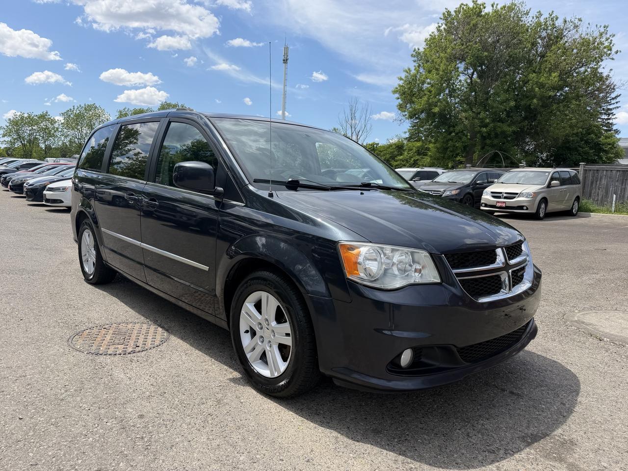 <p>Looking for a versatile and family-friendly ride that wont break the bank? Target Auto Centre has a fantastic option for you: a 2013 Dodge Grand Caravan Crew. This blue beauty, with its spacious black interior, is ready to tackle all your familys adventures, from school runs to weekend getaways. Its powerful 3.6L V6 engine ensures you have the get-up-and-go you need, all while offering the practical comfort of a minivan. With 187,664 kilometers on the odometer, this Grand Caravan has been well-loved and is eager for its next chapter. This 2013 Dodge Grand Caravan Crew is more than just a mode of transportation; its a mobile command centre designed for your familys comfort and convenience. Whether youre hauling sports equipment, groceries, or a carload of excited kids, the generous interior space has you covered. The smooth automatic transmission and front-wheel drive make for an easy and predictable driving experience, perfect for navigating Canadian roads in various conditions. Plus, with four doors, getting everyone in and out of the vehicle is a breeze.</p><p>&nbsp;</p><hr><p dir=ltr>&nbsp;</p><p dir=ltr><strong>CERTIFIED PRE-OWNED VEHICLE | BUY WITH CONFIDENCE</strong></p><p dir=ltr>&nbsp;- Ontario Safety Standards Certificate Included<br>- 30 Day / 1,000 KM Safety Warranty Included<br>- Fully Detailed Prior to Delivery<br>- CARFAX Vehicle History Report Available</p><p dir=ltr>&nbsp;</p><hr><p dir=ltr>&nbsp;</p><p dir=ltr><strong>VALUE AND TRANSPARENCY | WHY CHOOSE US</strong></p><p dir=ltr>- Price Plus HST & Licensing Only<br>- No Additional Fees | All-In Pricing<br>- Same Price Cash or Finance<br>- Extended Warranty Protection Plans Available<br>- Autotrader Best Priced Dealer Award (2024)<br>- Competitive Market Value on Trade-ins<br>- We&rsquo;ll Buy Your Car &mdash; No Purchase Required<br>- Know Someone Looking For a Vehicle? Get a Referral Award<br>- Open 7 Days a Week</p><p dir=ltr>&nbsp;</p><hr><p dir=ltr>&nbsp;</p><p dir=ltr><strong>ABOUT TARGET AUTO CENTRE</strong></p><p dir=ltr>Target Auto Centre has been proudly serving London, Ontario and surrounding areas for over 20 years, offering over 150 quality pre-owned vehicles and a constantly updated selection to choose from. We focus on providing competitive pricing, clear information, and a straightforward buying process so you know exactly what to expect from start to finish.</p><p dir=ltr>Cars For Everyone! We offer a wide selection of vehicles to fit every lifestyle, need, and budget. Our inventory includes cars, trucks, SUVs, and vans from trusted brands such as Ford, Chevrolet, Toyota, Honda, Nissan, BMW, Mercedes-Benz, Audi, Lexus, Acura, Hyundai, Kia, Mazda, Volkswagen, Jeep, RAM, GMC, Subaru, and more. With new arrivals regularly, there&rsquo;s always something for everyone.</p><p dir=ltr>As a proud member of the Used Car Dealers Association of Ontario (UCDA), we are committed to operating with honesty, transparency, and professionalism in every transaction. Our goal is to make your vehicle purchase as simple and stress-free as possible, while delivering the level of service our customers continue to trust. Come visit us today and see why were the preferred choice for pre-owned vehicles in London and the surrounding areas. We look forward to earning your business!</p>