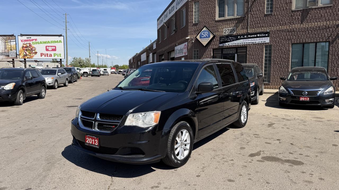 <p class=MsoNormal>This 2013 Dodge Grand Caravan is a fully-loaded vehicle that is ready for any journey you desire. With seating for up to 7 passengers, this caravan comes in an elegant black to ensure style as you drive. Experience comfort and convenience with its many features such as AC, cruise control, and even an entertainment system. This vehicle is accident-free, fully-certified, and ready for the road.&nbsp;</p><p class=MsoNormal>Financing is available for all credit types OAC. Carfax provided for every vehicle.</p><p class=MsoNormal>Prices include certification of vehicle, first oil change, and professional detailing; taxes and licensing extra.</p><p class=MsoNormal>3-month warranty included, can be extended for additional cost. Inquire for more details.</p><p class=MsoNormal>Family-run business with friendly staff. Our customers are our number one priority. Satisfaction guaranteed.</p><p>&nbsp;</p><p class=MsoNormal><strong>C.L.S Auto Sales</strong>&nbsp;2795 Barton St. E., Hamilton, ON, L8E 2J8. <br>Office #: 905-561-8030<span style=mso-tab-count: 1;>&nbsp;&nbsp;&nbsp;&nbsp;&nbsp;&nbsp;&nbsp;&nbsp;&nbsp; </span>After-Hours #: 905-517-4507</p>