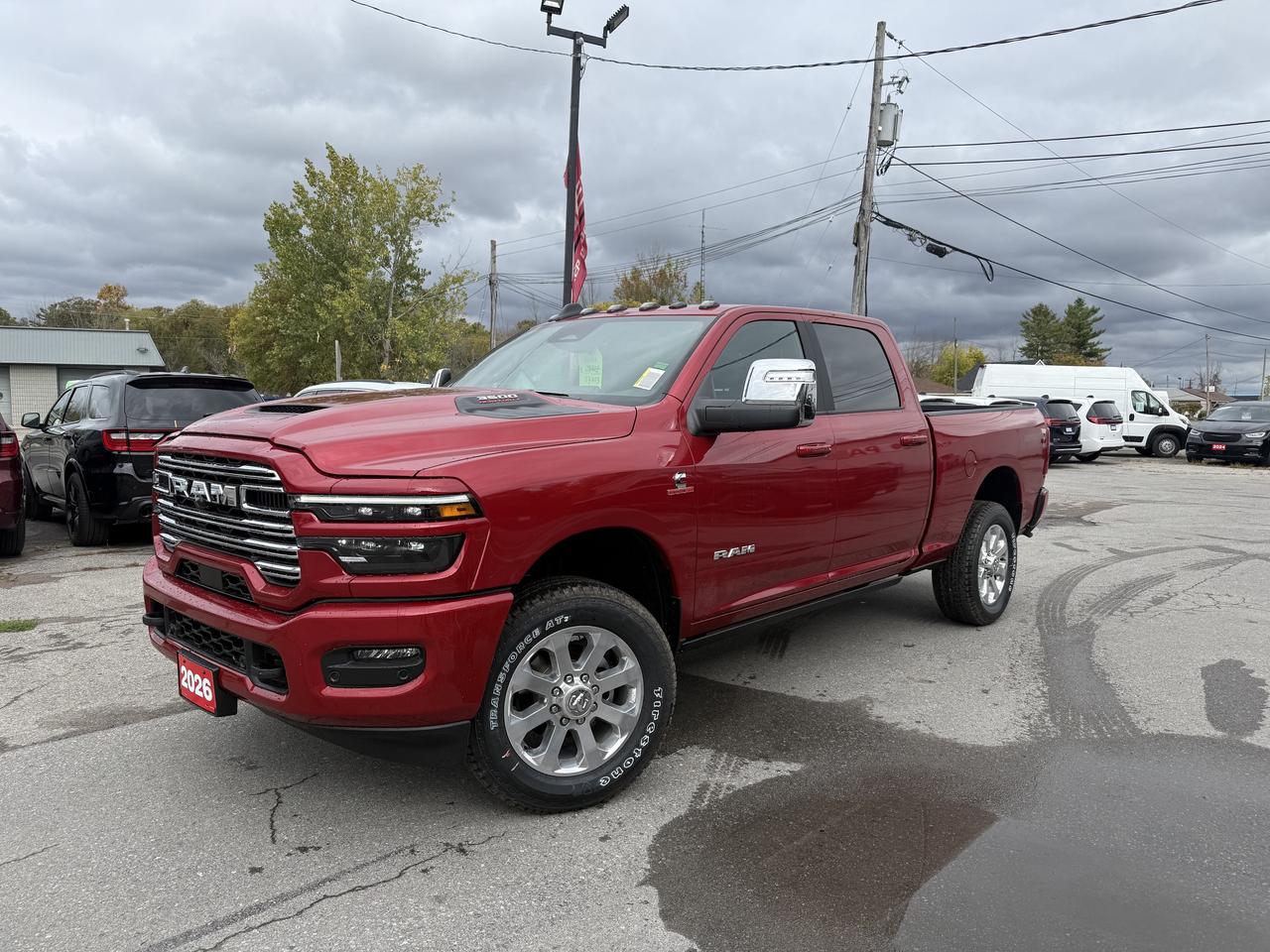 2026 RAM 3500 LARAMIE CREW CAB 4X4.  6.7L H/O CUMMINS DIESEL ENGINE WITH 8 SPEED AUTO TRANSMISSION.  14.4" SCREEN WITH NAVIGATION, 5TH WHEEL & GOOSENECK PREP GROUP, POWER DEPLOYABLE RUNNING BOARDS, HARMON KARDON SOUND SYSTEM, LEATHER HEATED & COOLED SEATS, REMOTE START, HEATED STEERING WHEEL, DUAL WIRELESS CHARGING PAD, REMOTE TAILGATE RELEASE, POWER DRIVER & PASSENGER SEATS WITH DRIVER MEMORY, CENTRE STOP LAMP WITH CARGO CAMERA, DEPLOYABLE BED STEP, MOPAR SPRAY IN BEDLINER, FORWARD COLLISION WARNING PLUS, BLIND SPOT WITH REAR CROSS PATH DETECTION, ADAPTIVE CRUISE CONTROL, PEDESTRIAN/CYCLIST EMERGENCY BRAKING, ACTOVE LANE MANAGEMENT SYSTEM & MORE!  ONLY HST EXTRA.