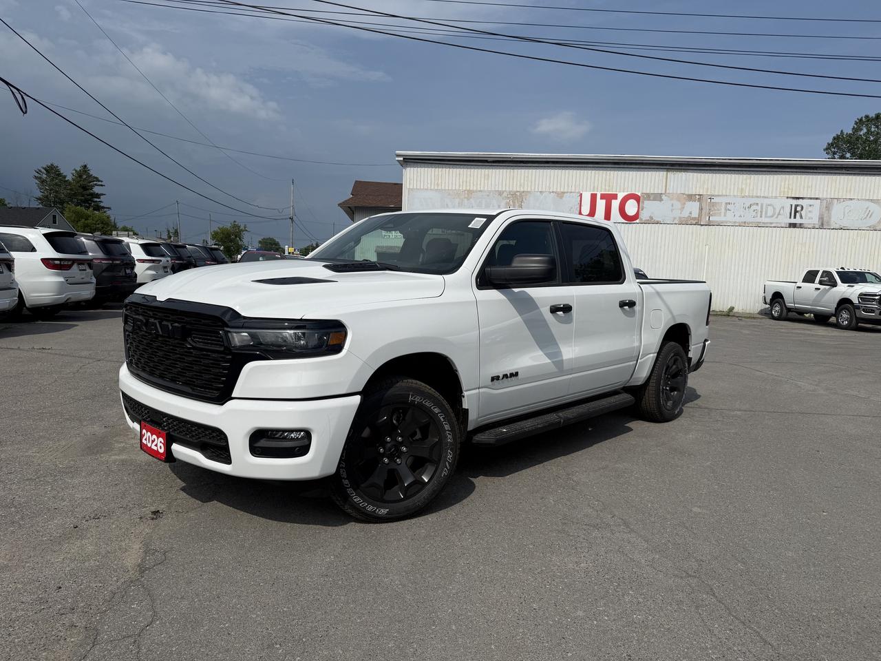 2026 RAM 1500 BLACK EXPRESS CREW CAB 4X4.  3.6L PENTASTAR ENGINE WITH 3.55 REAR AXLE RATIO.  8.4" SCREEN WITH APPLE CARPLAY OR ANDROID AUTO, REMOTE START, MOPAR SIDE STEPS, REAR POWER SLIDING WINDOW, SPORT PERFORMANCE HOOD, ANTI-SPIN DIFFERENTIAL REAR AXLE, XM RADIO, FRONT LED FOG LAMPS, REAR WHEELHOUSE LINERS, BODY-COLOUR REAR BUMPER WITH STEP PADS, ADAPTIVE CRUISE CONTROL, BLIND SPOT MONITOR WITH REAR CROSS PATH DETECTION, PEDESTRIAN EMERGENCY BRAKING, FRONT & REAR PARK ASSIST, ACTIVE LANE MANAGEMENT SYSTEM, DAMPENED TAILGATE, ADVANCED BRAKE ASSIST & MORE!  ONLY HST EXTRA. *ADVERTISED FINANCE PAYMENT IS PRE-TAX OVER 96 MONTHS WEEKLY AT 5.29%, WITH $0 DOWN, OAC.