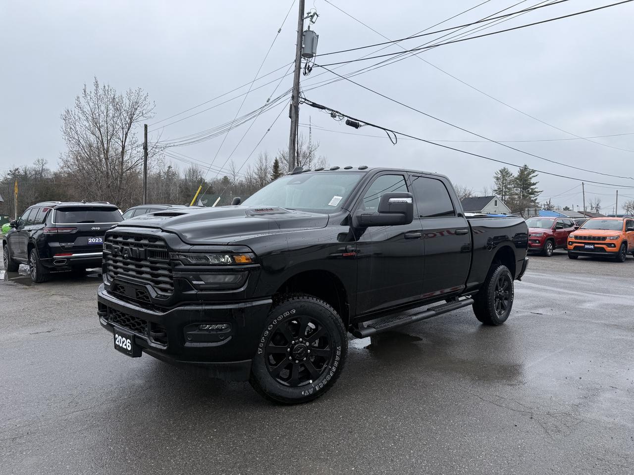2026 RAM 2500 BLACK EXPRESS CREW CAB 4X4.  6.7L CUMMINS DIESEL ENGINE WITH 8 SPEED AUTO TRANSMISSION.  12" SCREEN WITH NAVIGATION, 3.42 REAR AXLE RATIO, POWER HEATED FOLDING TELESCOPING EXTERIOR MIRRORS, MOPAR SIDE STEPS, MOPAR DEPLOYABLE BED STEP, SPRAY IN BEDLINER, ANTI-SPIN DIFFERENTIAL REAR AXLE, REAR POWER SLIDING WINDOW, DUAL ZONE CLIMATE CONTROL, MOPAR FRONT & REAR ALL WEATHER MATS, CLEARANCE LAMPS, ADAPTIVE CRUISE CONTROL, FRONT & REAR PARK ASSIST, FORWARD COLLISION WARNING PLUS, PEDESTRAIN/CYCLIST EMERGENCY BRAKING, CLASS V HITCH WITH 4 & 7 PIN WIRING HARNESS, FORWARD & REVERSE UTILITY LIGHTS, & MORE!  ONLY HST EXTRA.