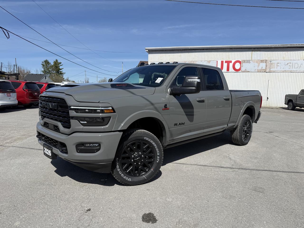 Top of the line Limited in Ceramic Grey!!! 2026 RAM 2500 LIMITED CREW CAB NIGHT 4X4.  6.7L CUMMINS TURBO DIESEL WITH 8 SPEED AUTO TRANSMISSION. Power Sunroof, Rambox Cargo Management, Spray in Bedliner,  Premium Heated and cooled Leather Buckets, Heated Steering wheel, Remote Starter, Power retracting side steps, Harman Kardon Audio, Roof Clearance Lamps, LED Headlamps, 20 inch Aluminum wheels, Heated rear seats, Dual Wireless Chargers, Satellite radio, Apple Carplay, Google Android auto, Dual zone climate control, Power folding and power telescopic Tow Mirrors, Surround view camera, Lane Changing Cameras, Trailer brake controller. Only HST extra. No Luxury Tax!!!!