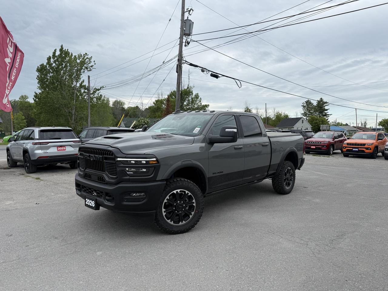 2026 RAM 2500 REBEL CREW CAB 4X4.  6.4L HEMI ENGINE WITH 8 SPEED AUTO TRANSMISSION.  POWER SUNROOF, HARMON KARDON SOUND SYSTEM, POWER DEPLOYABLE RUNNING BOARDS, LEATHER HEATED & COOLED SEATS, 14.4" SCREEN WITH NAVIGATION, POWER DRIVER & PASSENGER SEATS WITH DRIVER MEMORY SETTINGS, CENTRE STOP LAMP WITH CARGO VIEW CAMERA, 5TH WHEEL & GOOSENECK PREP GROUP, TRI-FOLD TONNEAU COVER, DEPLOYABLE BED STEP, AUTO HIGH BEAM CONTROL, MOPAR ALL WEATHER MATS, FRONT PASSENGER SCREEN, DUAL WIRELESS CHARGING PADS, 2ND ROW HEATED SEATS, HEATED STEERING WHEEL, REMOTE START, POWER FOLDING/TELESCOPING SIDE MIRRORS, ADJUSTABLE PEDALS, ADAPTIVE CRUISE CONTROL, FORWARD COLLISION WARNING PLUS, BLIND SPOT WITH REAR CROSS PATH DETECTION, PEDESTRIAN/CYCLIST EMERGENCY BRAKING, & MORE!  ONLY HST EXTRA.