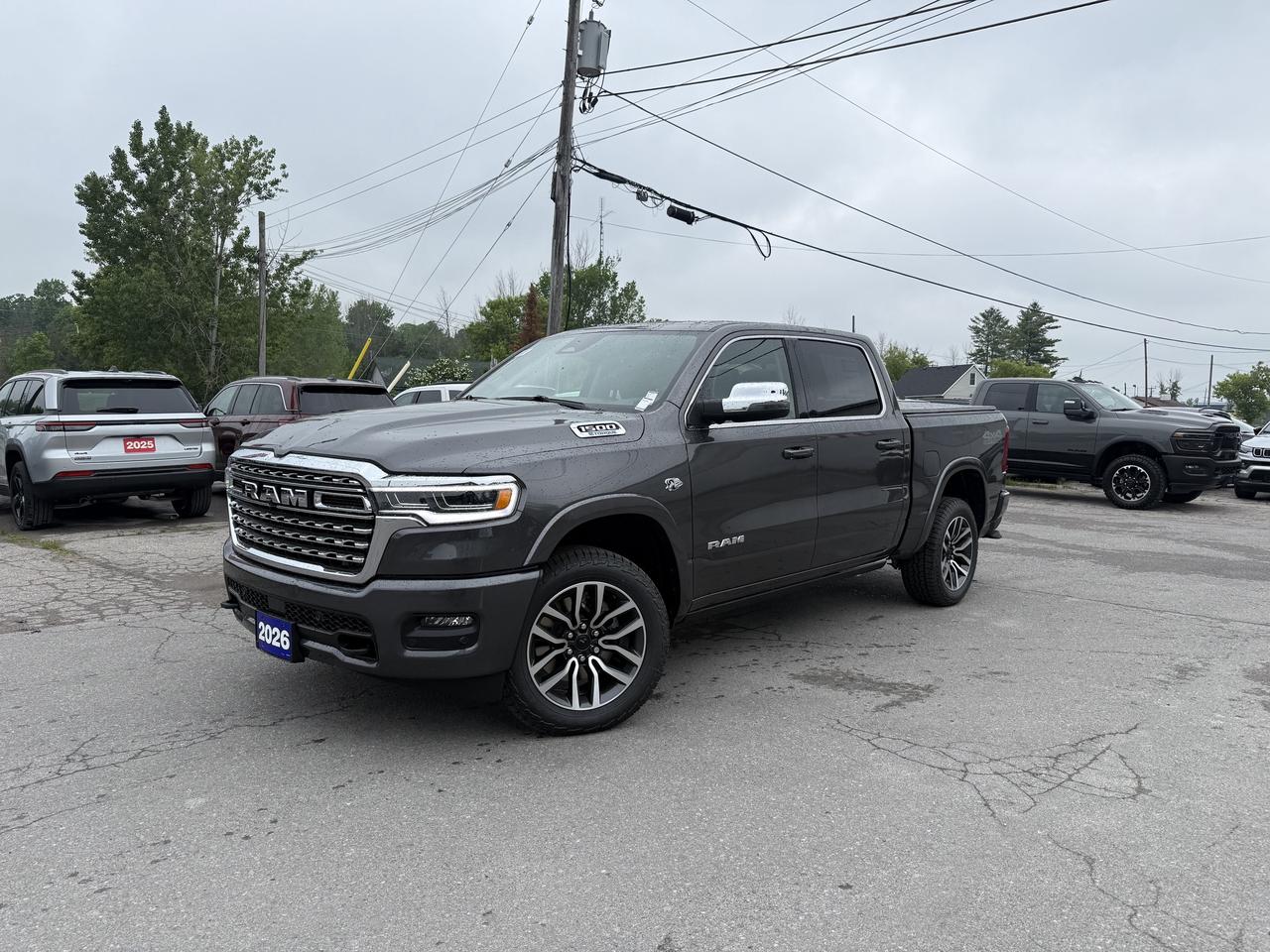 2026 RAM 1500 LONGHORN CREW CAB 4X4.  5.7L HEMI ENGINE WITH 8 SPEED AUTO TRANSMISSION.  PANORAMIC SUNROOF, 12" SCREEN WITH NAVIGATION, FRONT MASSAGE BACK SEATS, HARMON KARDON SOUND SYSTEM, PREMIUM HEATED & COOLED LEATHER SEATS WITH FILIGREE, TRAILER BRAKE CONTROLLER, PASSIVE COLD END ENHAUST, POWER DRIVER & PASSENGER SEATS WITH DRIVER MEMORY SETTINGS, RAISED RIDE HEIGHT, 2ND ROW HEATED SEATS, MOPAR DEPLOYABLE BED STEP, SPRAY IN BEDLINER, REMOTE START, HEATED STEERING WHEEL, ADAPTIVE CRUISE CONTROL, BLIND SPOT MONITOR WITH REAR CROSS PATH DETECTION, FORWARD COLLISION WARNING PLUS, FRONT & REAR PARK ASSIST, ACTIVE DRIVING ASSIST, PASSENGER SCREEN, POWER TAILGATE, HEAVY-DUTY ENGINE COOLING, & MORE!  ONLY HST EXTRA.