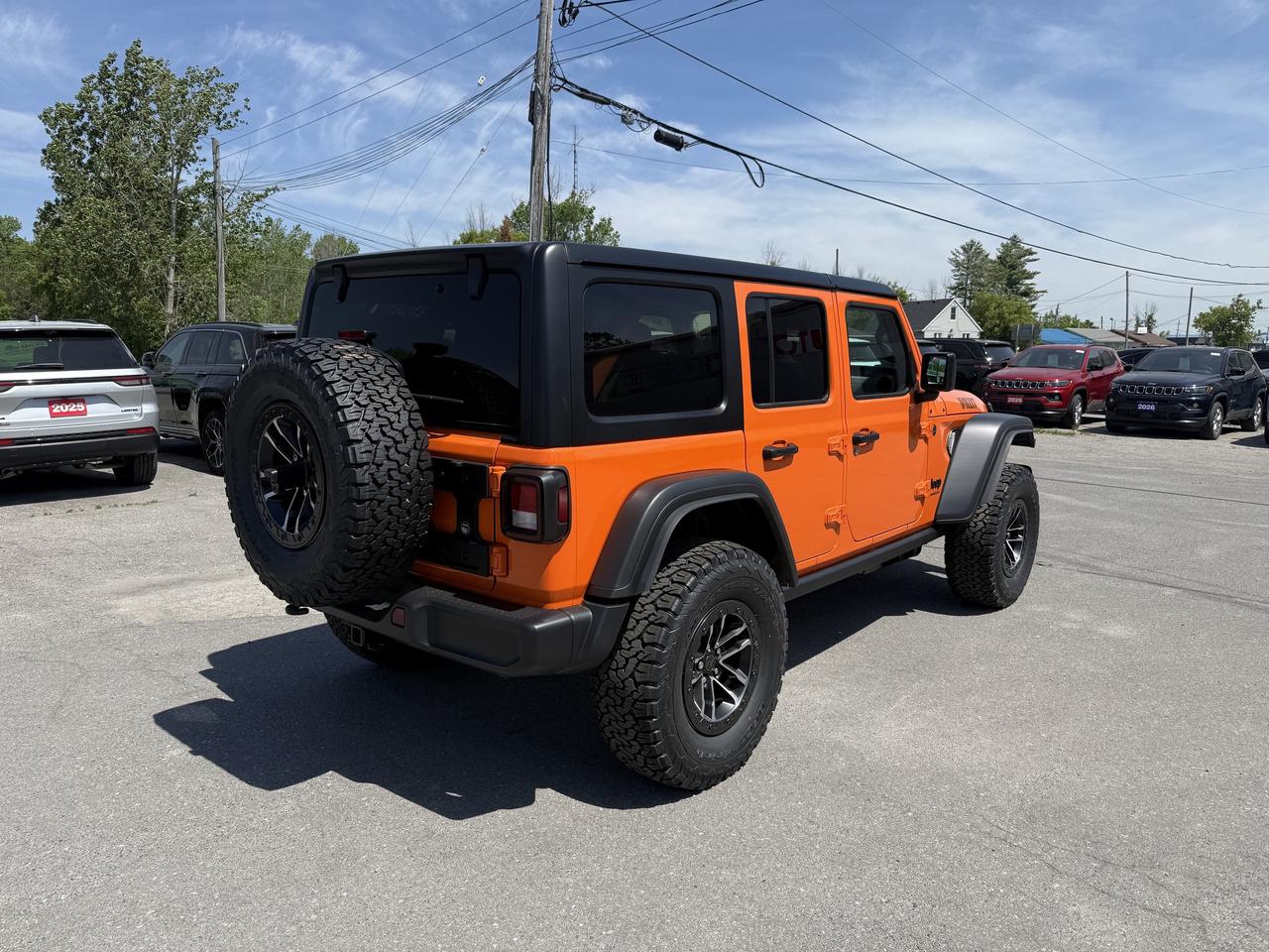 2026 Jeep Wrangler Willys 4 Door 4X4 - 35" Tire - Leather - Dual Top! Photo