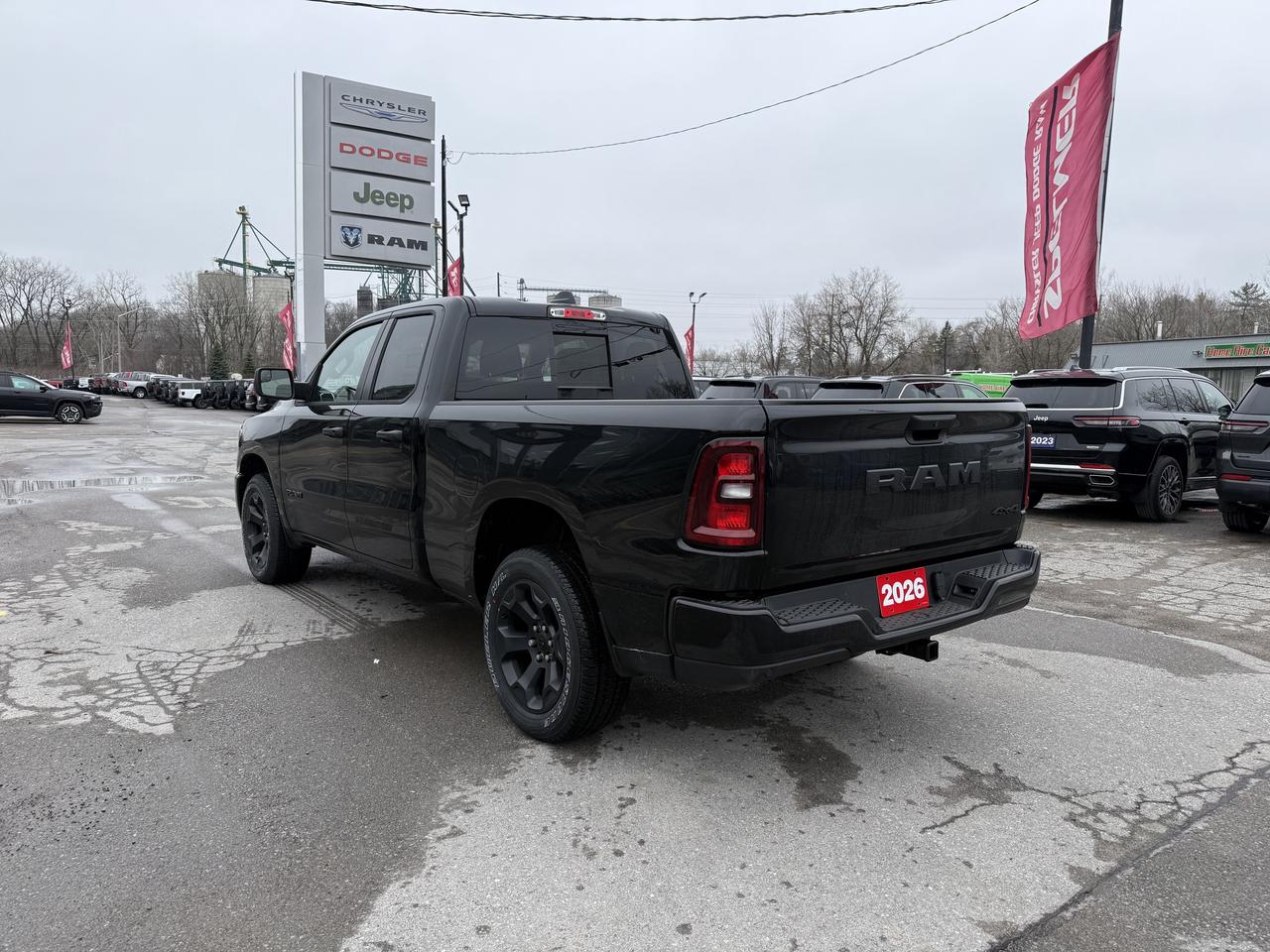 2026 RAM 1500 Black Express 4x4 Quad Cab 6'4  Box Photo2