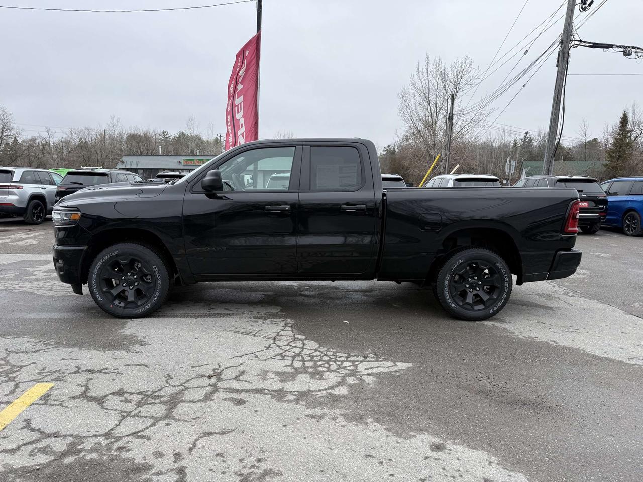2026 RAM 1500 Black Express 4x4 Quad Cab: As low at $190/wk Photo1