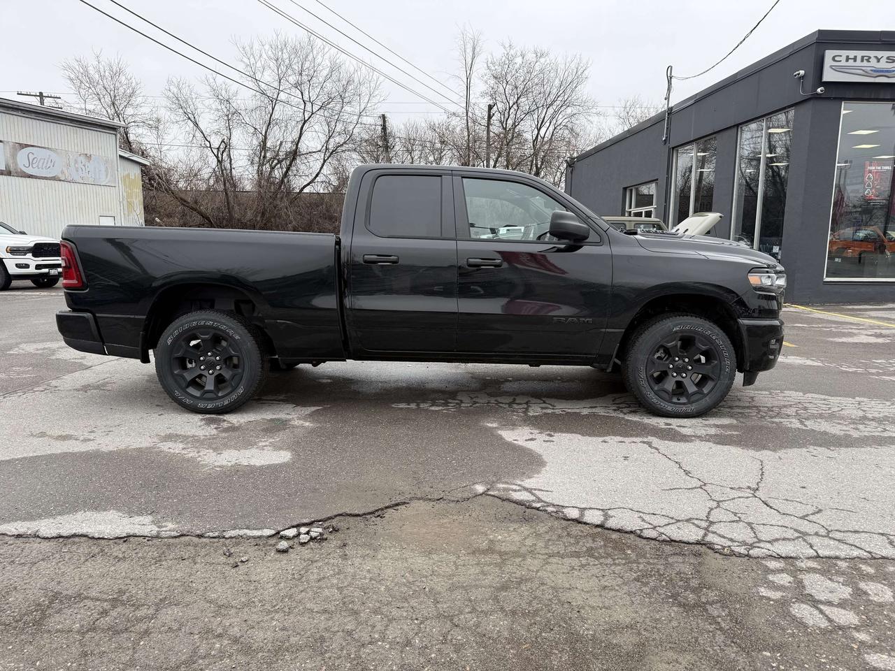 2026 RAM 1500 Black Express 4x4 Quad Cab: As low at $190/wk Photo