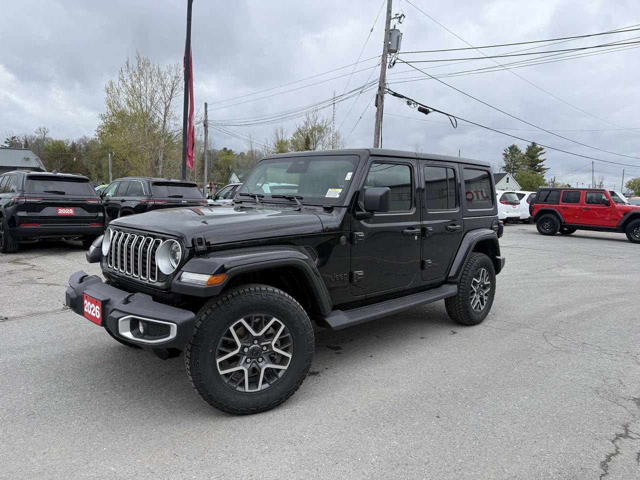 2026 JEEP WRANGLER SAHARA 4 DOOR 4X4.  2.0L TURBO ENGINE WITH 8 SPEED AUTO TRANSMISSION.  12.3" SCREEN WITH NAVIGATION, MCKINLEY LEATHER HEATED SEATS, ALPINE SOUND SYSTEM, HEATED STEERING WHEEL, REMOTE START, POWER DRIVER & PASSENGER SEATS, REAR PARK ASSIST, BLIND SPOT MONITOR WITH REAR CROSS PATH DETECTION, ADAPTIVE CRUISE CONTROL, FORWARD COLLISION WARNING PLUS, INTEGRATED OFF-ROAD CAMERA, MOPAR ALL WEATHER FLOOR MATS, UNIVERSAL GARAGE DOOR OPENER, NON-VENTED STEEL HOOD, DANA M220 REAR AXLE, & MORE! ONLY HST EXTRA.
