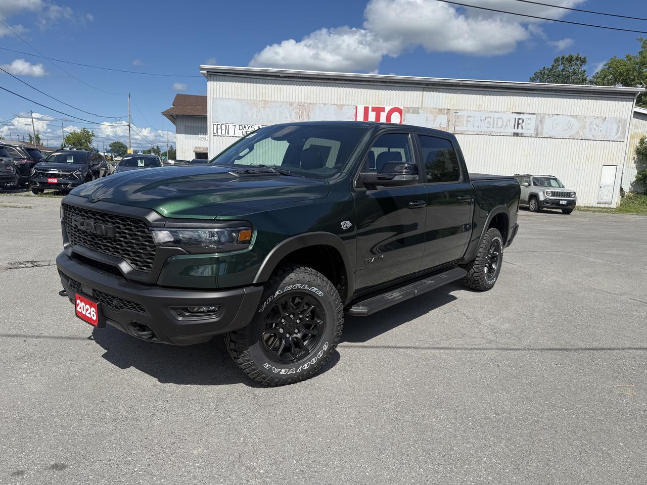 2026 RAM 1500 REBEL CREW CAB 4X4.  5.7L HEMI ENGINE WITH 3.92 REAR AXLE RATIO.  PANORAMIC SUNROOF, HARMON KARDON SOUND SYSTEM, LUXURY LEATHER HEATED & COOLED SEATS, POWER TAILGATE, TRAILER BRAKE CONTROLLER, PASSIVE COLD END EXHAUST, HEAVY-DUTY ENGINE COOLING, POWER DRIVER & PASSENGERS SEATS WITH DRIVER MEMORY SETTINGS, 2ND ROW HEATED SEATS, HEATED STEERING WHEEL, REMOTE START, MOPAR SIDE STEPS, TRI-FOLD TONNEAU COVER, DUAL WIRELESS CHARGING PADS, 14.4" SCREEN WITH NAVIGATION, PASSENGER SCREEN, POWER ADJUSTABLE PEDALS, ADAPTIVE CRUISE CONTROL, BLIND SPOT MONITOR WITH REAR CROSS PATH DETECTION, ACTIVE LANE MANAGEMENT SYSTEM, FORWARD COLLISION WARNING PLUS, & MORE!  ONLY HST EXTRA.