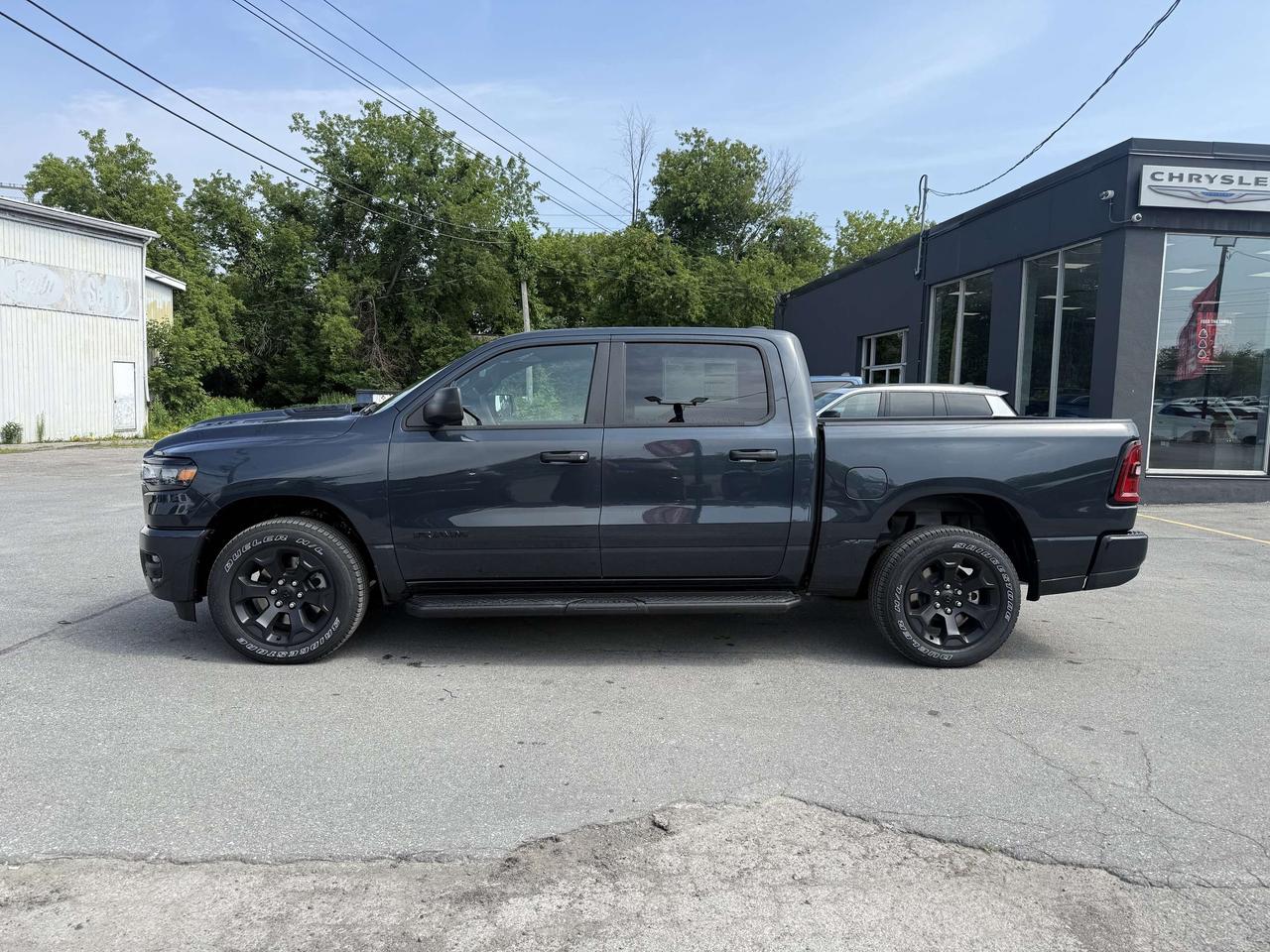 2026 RAM 1500 Black Express Crew 4X4: $192/week Photo