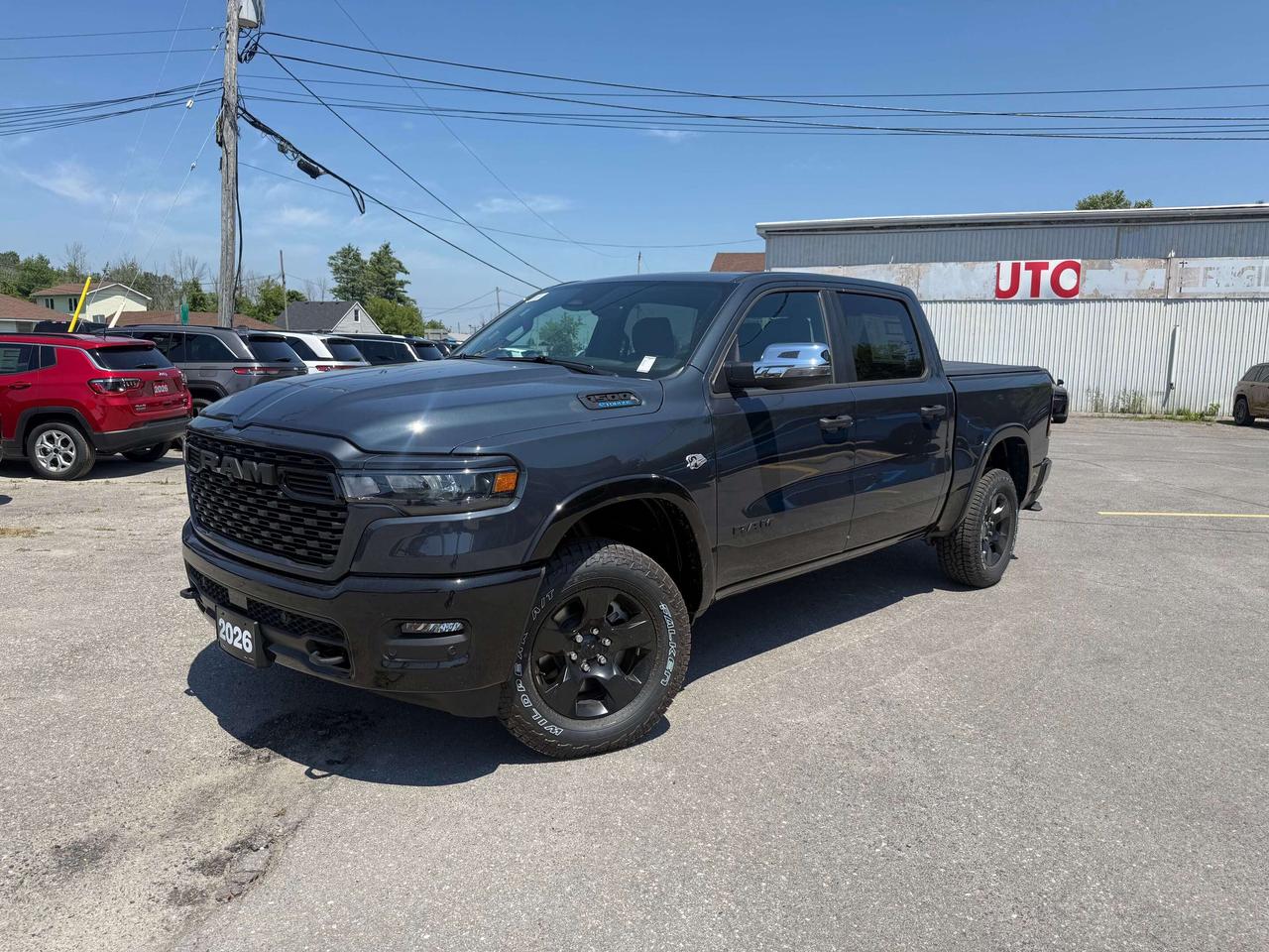 2026 RAM 1500 BIG HORN BACKCOUNTRY CREW CAB 4X4.  5.7L HEMI ENGINE WITH 3.92 REAR AXLE RATIO.    12" SCREEN WITH NAVIGATION, RAISED RIDE HEIGHT, ALPINE SOUND SYSTEM, POWER DRIVER SEAT, HEATED SEATS & STEERING WHEEL, REMOTE START, PASSIVE COLD END EXHAUST, REAR POWER SLIDING WINDOW, SOFT TRI-FOLD TONNEAU COVER, REMOTE TAILGATE RELEASE, POWER ADJUSTABLE PEDALS, MOPAR ALL WEATHER FLOOR MATS, DEPLOYABLE BED STEP, SPRAY IN BEDLINER, E-LOCKER REAR AXLE, ADAPTIVE CRUISE CONTROL, BLIND SPOT MONITOR WITH REAR CROSS PATH DETECTION, ACTIVE LANE MANAGEMENT SYSTEM, FORWARD COLLISION WARNING PLUS, & MORE!  ONLY HST EXTRA. *ADVERTISED FINANCE PAYMENT IS PRE-TAX OVER 96 MONTHS WEEKLY AT 5.29%, WITH $0 DOWN, OAC.