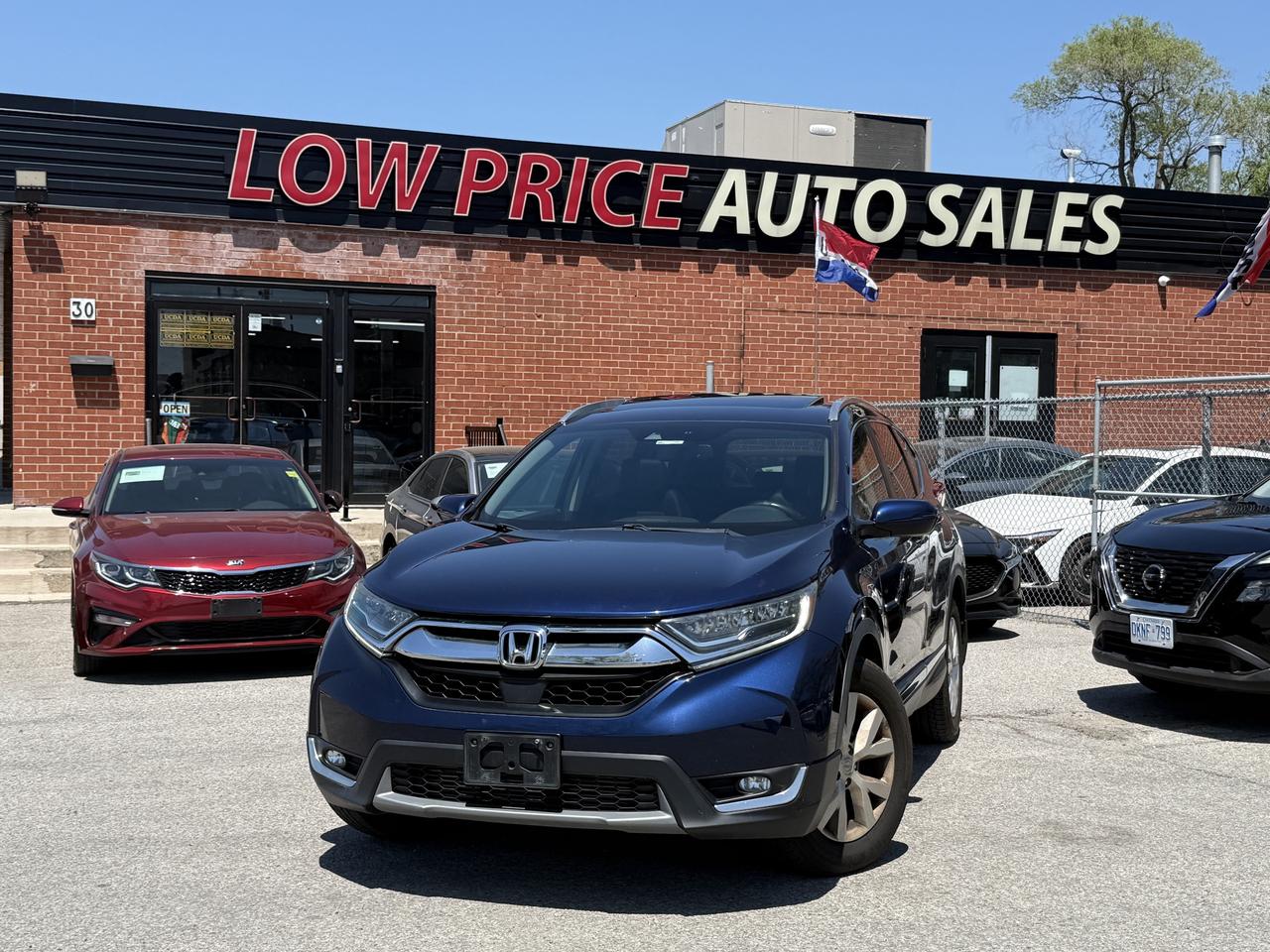 2019 Honda CR-V Touring l AWD l 1.5L l 4Cyl l Auto l Eco Vehicle Photo