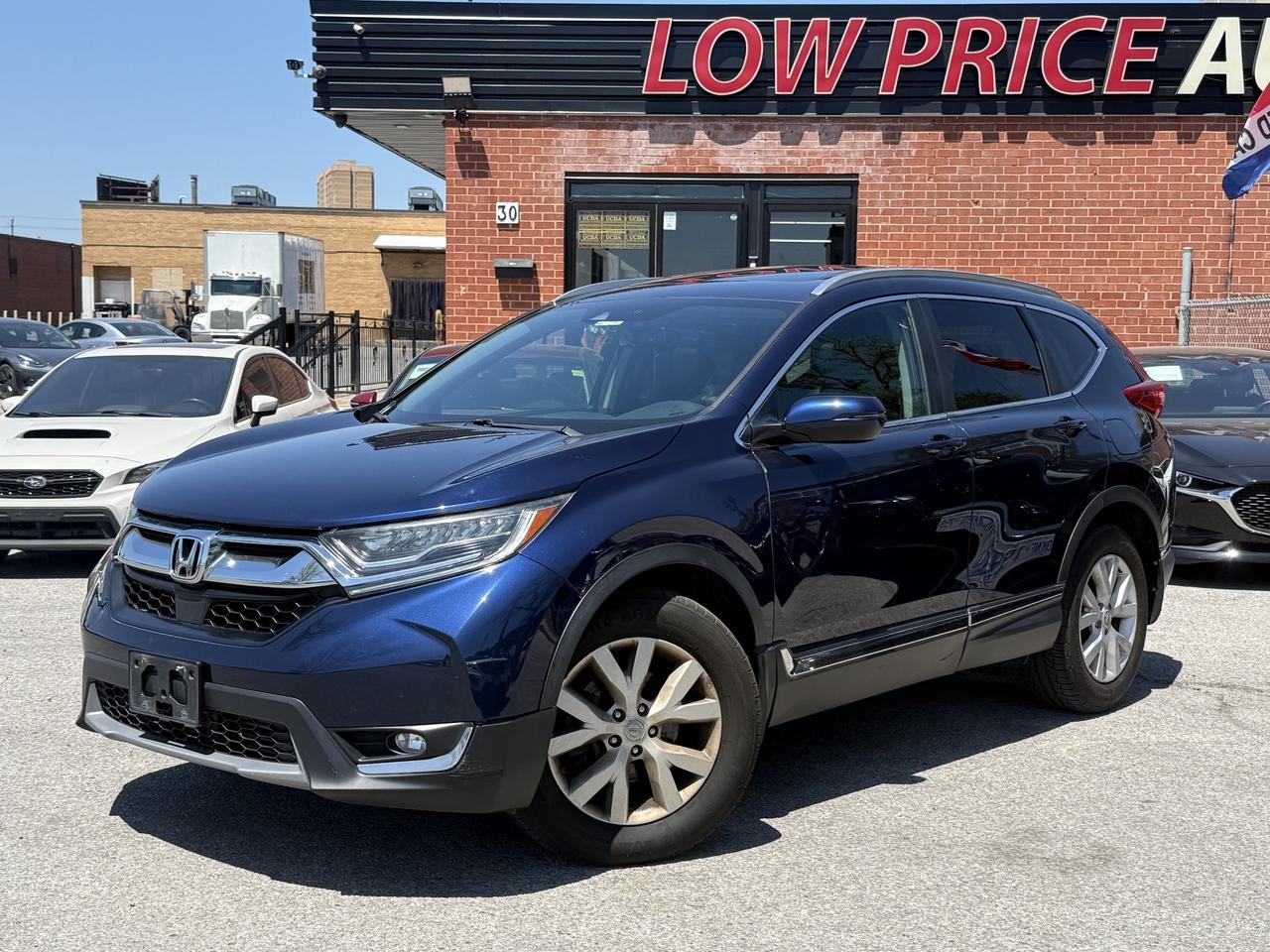 2019 Honda CR-V Touring l AWD l 1.5L l 4Cyl l Auto l Eco Vehicle Photo