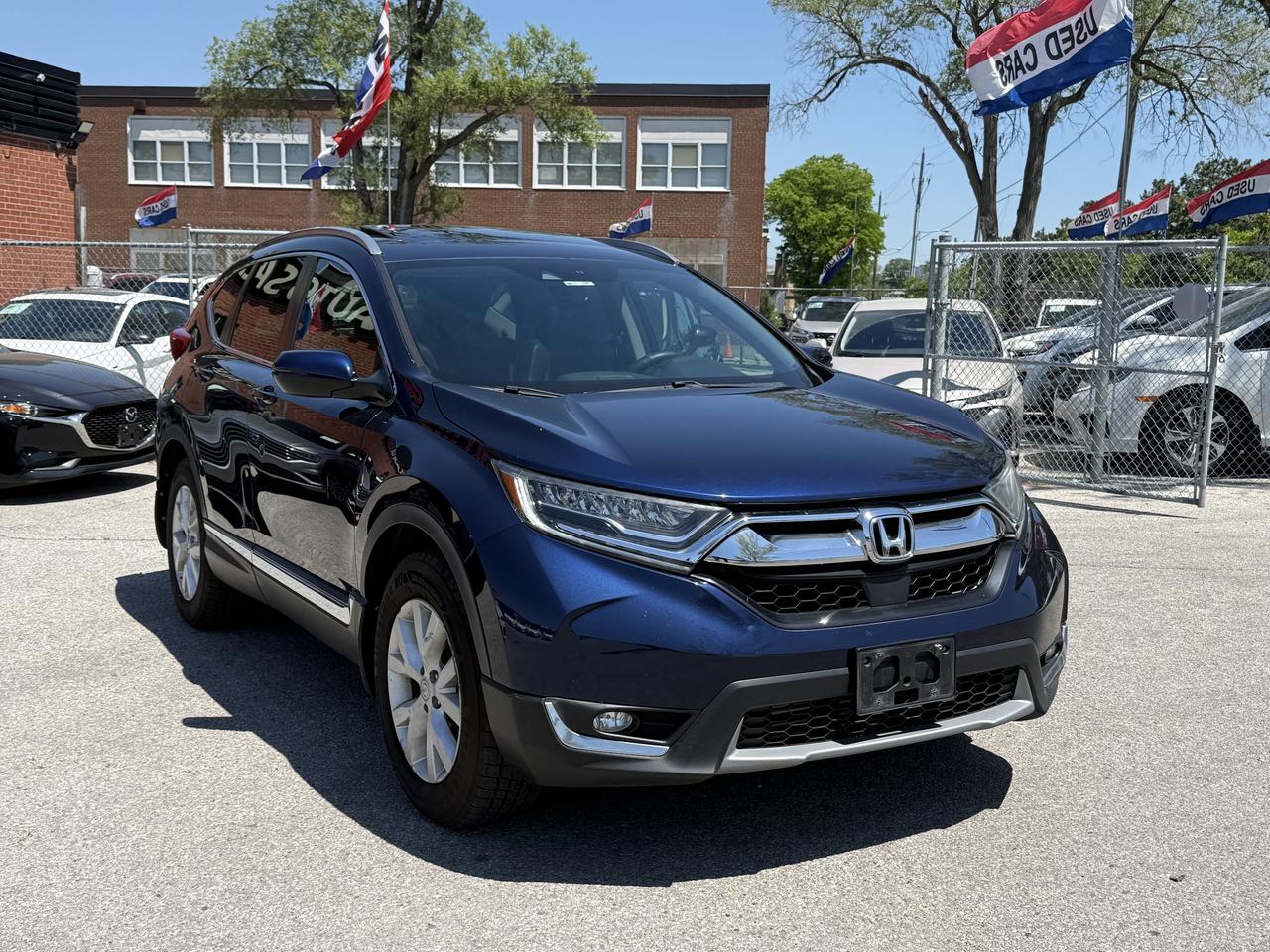 2019 Honda CR-V Touring l AWD l 1.5L l 4Cyl l Auto l Eco Vehicle Photo