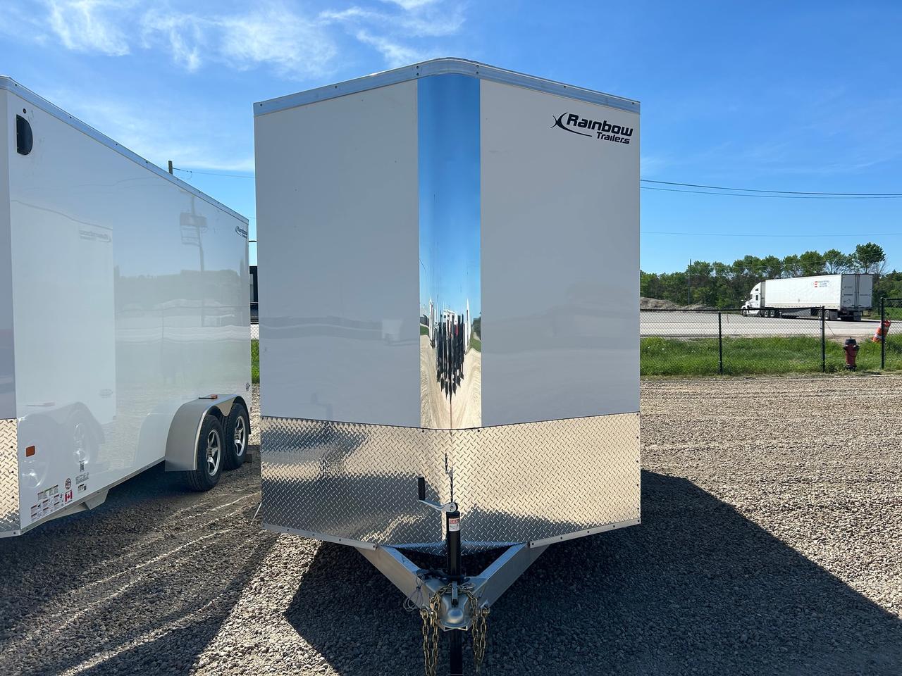 <p><span class=NormalTextRun SCXW91595049 BCX0>7 x 14 Rainbow All Aluminum Excursion with a Ramp Door, tandem&nbsp;</span><span class=NormalTextRun SCXW91595049 BCX0>3500lb</span><span class=NormalTextRun SCXW91595049 BCX0>&nbsp;axles, GVWR&nbsp;</span><span class=NormalTextRun SCXW91595049 BCX0>7000 lbs, aluminum wheel upgrade with matching spare mounted rear drivers side high, 84 interior height, side door with bar lock, translucent roof</span><span class=NormalTextRun SCXW91595049 BCX0>. &nbsp; Empty weight 1609 lbs. </span><span class=NormalTextRun SCXW91595049 BCX0>A Rainbow Cargo Trailer is built with quality and designed to help you get your cargo or equipment from point A to point B in an environment protected from dust and weather</span><span class=NormalTextRun SCXW91595049 BCX0>.&nbsp;&nbsp;</span><span class=NormalTextRun SCXW91595049 BCX0>Standard features: 3/8&rdquo; plywood interior wall, rear ramp with transition flap, easy lube spring axles, 4 leaf spring suspension, metal preparation by acid washing, 2 part epoxy primer, high quality black topcoat paint, 0.030 Aluminum skin, aluminum checker plate stone guard protection,&nbsp;</span><span class=NormalTextRun SCXW91595049 BCX0>one piece translucent roof, LED lights, one 3.5&rdquo; round wall vent</span><span class=NormalTextRun SCXW91595049 BCX0>, hitch sprayed with stone</span><span class=NormalTextRun SCXW91595049 BCX0>&nbsp;</span><span class=NormalTextRun SCXW91595049 BCX0>guard, primed steel under deck, wall mounted interior light with switch.</span></p>