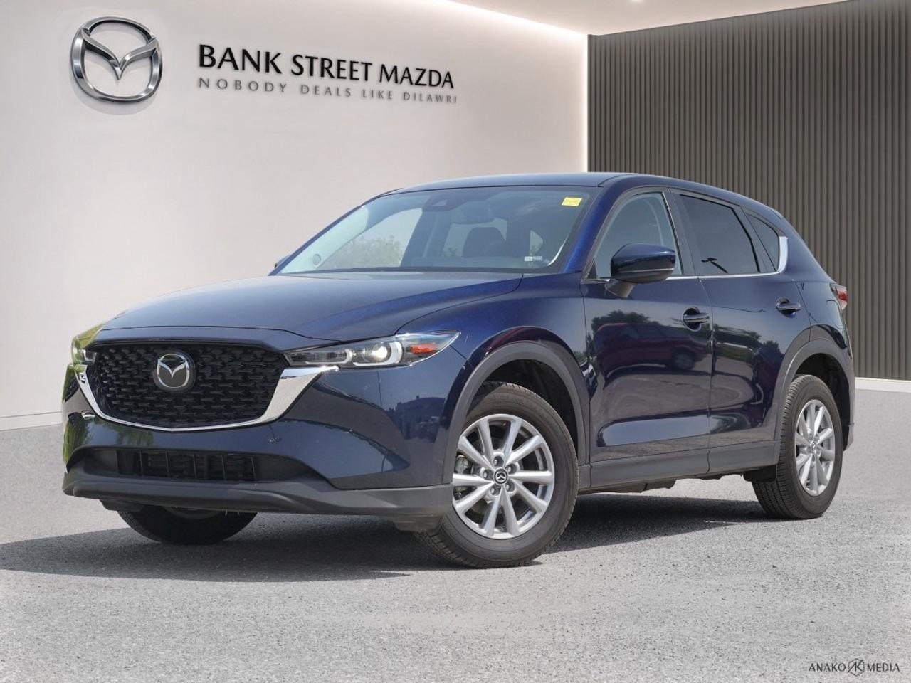 Experience the charm of the 2024 Mazda CX-5 GS AWD with its rich design and dynamic performance. This SUV, in a timeless color, offers all-wheel drive for those seeking confidence in handling across various terrains. The exterior boasts stylish alloy wheels, enhancing its road presence, while inside, youll find a thoughtfully designed cabin with comfortable heated seats, perfect for Canadian winters. A touch of modern convenience is evident with features like power seats and power windows. Stay connected and entertained with smart device integration and a crystal-clear Bluetooth connection, all while relying on the advanced backup camera for effortless parking. Safety is a priority with lane assist and brake assist, ensuring peace of mind on every journey. Perfect for tech-savvy individuals or families who value safety and comfort, this Mazda is ready to meet your needs. Contact Bank Street Mazda today for more information, and let this exceptional vehicle become a part of your daily adventures.