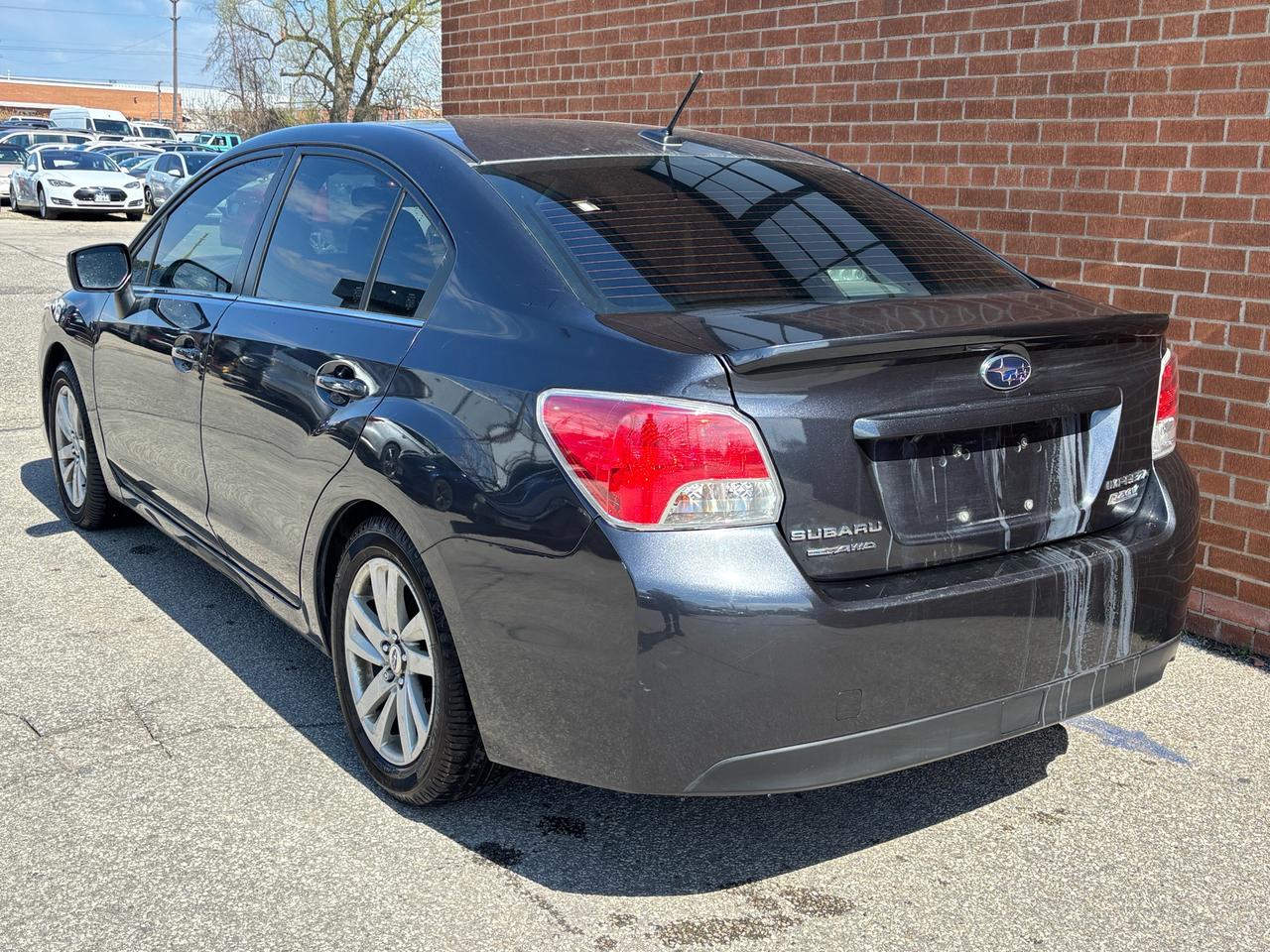 2016 Subaru Impreza 4dr Sdn CVT 2.0i w/Sport Pkg Photo