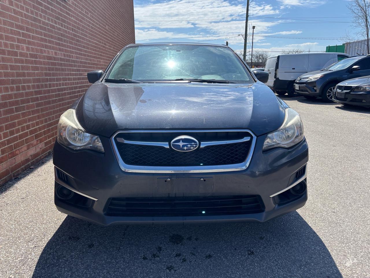 2016 Subaru Impreza 4dr Sdn CVT 2.0i w/Sport Pkg Photo