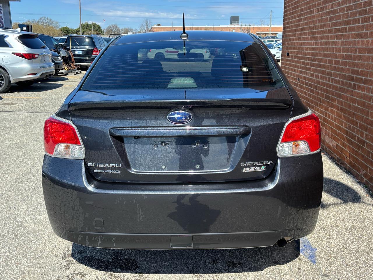 2016 Subaru Impreza 4dr Sdn CVT 2.0i w/Sport Pkg Photo