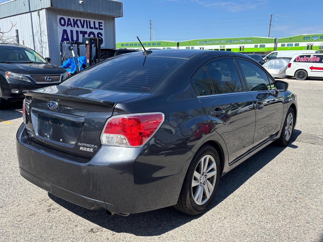 2016 Subaru Impreza 4dr Sdn CVT 2.0i w/Sport Pkg Photo