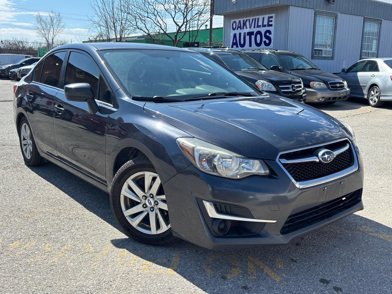 2016 Subaru Impreza 4dr Sdn CVT 2.0i w/Sport Pkg Photo