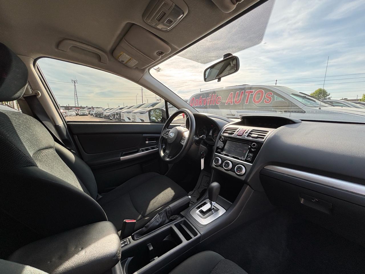 2016 Subaru Impreza 4dr Sdn CVT 2.0i w/Sport Pkg Photo