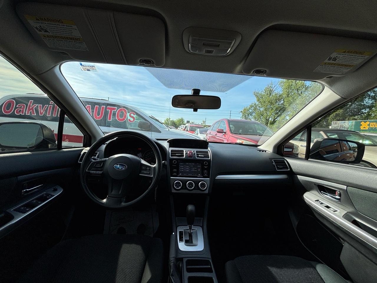 2016 Subaru Impreza 4dr Sdn CVT 2.0i w/Sport Pkg Photo