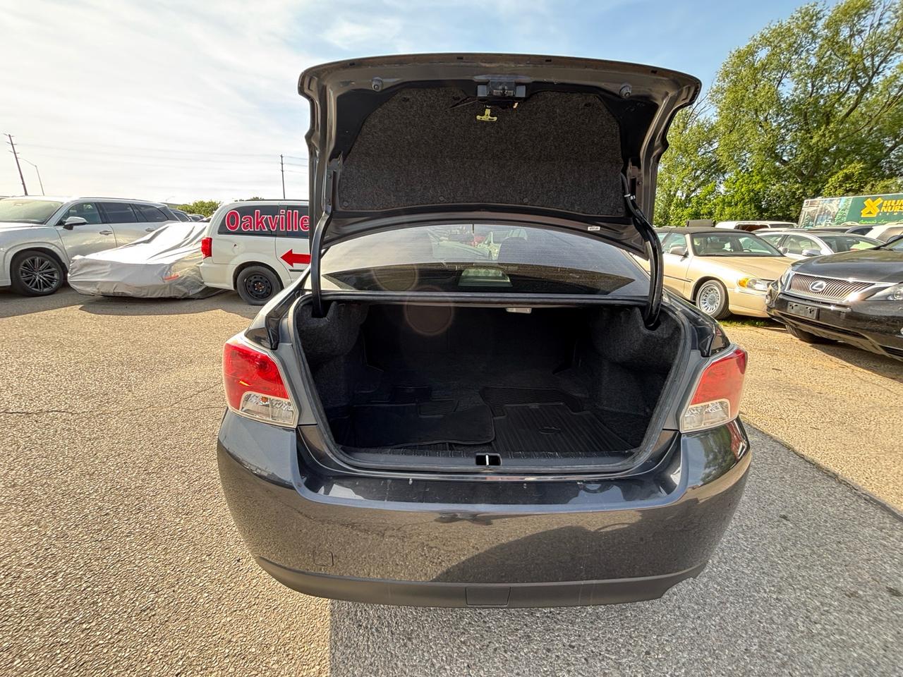 2016 Subaru Impreza 4dr Sdn CVT 2.0i w/Sport Pkg Photo