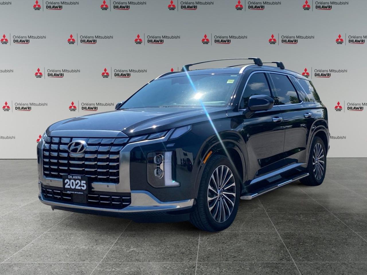 The 2025 Hyundai Palisade Ultimate Calligraphy 7-Passenger AWD in stunning black is the perfect blend of style, comfort, and capability. With its AWD drivetrain and automatic transmission, it offers excellent handling for Canadian roads, whether youre navigating busy city streets or cruising on the highway. On the outside, the Palisades black SUV design exudes confidence and elegance, drawing attention with its alloy wheels and metallic trim. Inside, the lavish interior features genuine leather seating and a leather-wrapped steering wheel, embodying Hyundais commitment to quality and craftsmanship. This Ultimate Calligraphy model is designed for comfort with heated and cooled front and rear seats, ensuring all passengers ride in luxury. The Palisade is packed with cutting-edge technology and safety features. The intuitive navigation system and heads-up display keep you informed at a glance, while smart device integration with Bluetooth keeps you connected on the go. Safety is enhanced with lane assist, brake assist, parking sensors, and a backup camera, making every drive more secure and worry-free. The sunroof / moonroof and third-row seating offer versatility and enjoyment for your journeys. Ideal for families and adventurers who crave both luxury and practicality, the 2025 Hyundai Palisade stands out as an SUV that caters to your every need. Contact Orleans Mitsubishi today to explore this remarkable vehicle and learn more about its impressive features.