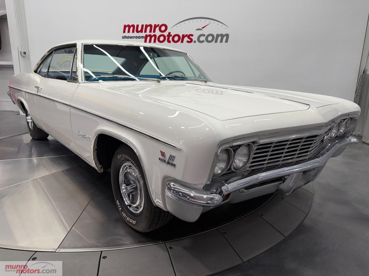 Vehicle Highlights include: True Super Sport (SS) Coupe, Numbers Matching Big Block 396, 4 Speed Manual Transmission, Power Steering, Dual Exhaust with Magnaflow Mufflers, SS Wheel Covers, BF Gooderich Radial Tires, Bucket Seats, Floor Console, Factory Tachometer, 4 Guage Instrument Cluster, & Rubber Floor Mats. <br /><br /> The 1966 Chevrolet Impala SS stands as one of the most iconic full-size American performance cars of the muscle car era. Combining bold styling, powerful engine options, and luxurious appointments, the Impala Super Sport represented the perfect balance of performance and comfort during one of the most exciting periods in automotive history. Today, it remains one of the most recognizable and sought-after classics ever produced by Chevrolet. <br /><br /> The 1966 model year marked the final redesign of the fourth-generation Impala and introduced a cleaner, more refined appearance that has become a favorite among collectors. Distinctive body lines, a wide stance, and elegant proportions gave the Impala SS a commanding presence on the road. The signature SS badging, bright trim accents, and sporty styling cues distinguished it from standard Impala models while reinforcing its performance-oriented identity. <br /><br /> Adding to this Impala SS's desirability is its numbers-matching 396 cubic-inch Big Block V8 (325hp), paired with a highly sought-after 4-speed manual transmission. As one of Chevrolet's legendary powerplants from the muscle car era, the 396 delivers the kind of effortless torque, distinctive exhaust note, and commanding performance that enthusiasts crave. <br /><br /> Combined with the engaging 4 speed manual gearbox, this drivetrain configuration provides a truly immersive driving experience, allowing the driver to fully appreciate the power and character of one of Chevrolet's most celebrated big block engines. <br /><br /> Inside, the Super Sport package transformed the Impala into a true personal luxury-performance car. Bucket seats, a center console, distinctive instrumentation, and upgraded interior trim created a driver-focused environment that was both comfortable and stylish. The spacious cabin offered generous room for passengers while maintaining the sporty character that defined the SS name. <br /><br /> Finished in elegant Ermine White, this 1966 Chevrolet Impala SS perfectly captures the style and sophistication that defined the golden age of American motoring. The crisp white exterior beautifully accentuates the Impala's long, flowing body lines, distinctive chrome trim, and muscular SS styling cues, creating a timeless appearance that remains just as striking today as it was in 1966. <br /><br /> Complementing the exterior is a handsome Blue interior that adds a vibrant yet refined contrast, giving the cabin a classic period-correct look that reflects the era's attention to detail and craftsmanship. <br /><br /> Together, the Ermine White exterior and Blue interior create a highly desirable color combination that highlights the Impala SS's blend of luxury, performance, and unmistakable mid-century American character. Whether displayed at a car show or enjoyed on a weekend cruise, this classic color pairing ensures the car stands out with elegance and authenticity. <br /><br /> One of the most appealing aspects of the 1966 Impala SS is its versatility. Equally at home on the show field, at weekend cruises, or on long highway journeys, the Impala combines classic American styling with a smooth, comfortable ride. Its substantial size and unmistakable design make it an instant conversation piece wherever it appears. <br /><br /> More than half a century after it first rolled off the assembly line, the 1966 Chevrolet Impala SS continues to capture the attention of enthusiasts and collectors around the world. Its combination of timeless styling, V8 performance, chrome-laden elegance, and historical significance has secured its place among the most beloved American automobiles ever built. <br /><br /> Whether admired for its striking appearance, cherished for its connection to the muscle car era, or enjoyed as a weekend cruiser, the 1966 Chevrolet Impala SS represents a remarkable chapter in Chevrolet history. It remains a symbol of an era when style, comfort, and performance came together to create one of the most memorable cars of the twentieth century. <br /><br /> True Mileage Unknown. Come on down to Munro Motors & see this one for yourself, it is in stock. We will look forward to seeing you real soon! <br /><br /> True Mileage Unknown <p>Carfax: <a target=_blank rel=noopener noreferrer nofollow href=https://vhr.carfax.ca/?id=Y5SRyGeCSM2226gXFry5CwvPOX03MV8m>https://vhr.carfax.ca/?id=Y5SRyGeCSM2226gXFry5CwvPOX03MV8m</a></p><p></p><p>Check us out on youtube: click here</p><p>Like us on Facebook: <a target=_blank rel=noopener noreferrer nofollow href=https://www.facebook.com/munromotors/>https://www.facebook.com/munromotors/</a></p><p>We are located in Brantford, Ontario; Telephone City and the hometown of hockey legend Wayne Gretzky. Formerly located in St. George, Ontario for ten years, we are still east of London, south of Cambridge, and west of Hamilton. In order to get our customers to come here, we have to have great prices and then when you get here, we have to have a great car in order to earn your business.</p><p>Our business hours are Monday to Friday 10am to 5pm. We are closed on Saturdays and Sundays.</p><p>At Munro Motors, we find unique vehicles and post our entire stock online in order to ensure that our vehicles find their happy home.</p><p>To ensure our customers can get what they've always wanted, we offer financing services through TD Auto Finance, Desjardins, CIBC Auto Finance and Independent Leasing Companies on vehicles that are less than ten model years old and boats that are less than twenty-five model years old.</p><p>We also offer warranty products through Lubrico and GVC warranties to ensure that your mechanical baby stays in tip-top condition.</p><p>All of our vehicles are hand-picked by the very knowledgeable owner, Andy Munro, who has been connecting people to their dreams for many years.</p><p><a target=_blank rel=noopener noreferrer nofollow href=http://Munromotors.com>Munromotors.com</a></p><p>Email: <a target=_blank rel=noopener noreferrer nofollow><u>sales@munromotors.com</u></a></p><p>Most of our vehicles are alread y reconditioned, saftied, etested and ready to drive home with you.</p><p>Delivery is available. Ask for details</p><p>All prices are subject to HST and licensing, no hidden fees.</p>