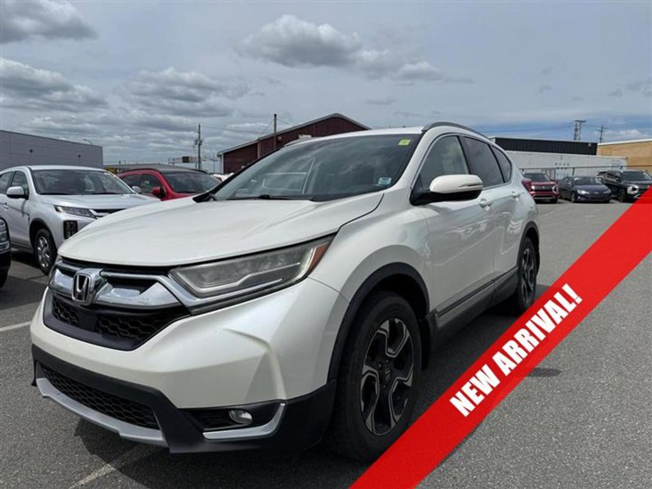Recent Arrival! 2017 Honda CR-V Touring AWD, 18 Aluminum Alloy Wheels, Apple CarPlay/Android Auto, Heated front seats, Heated rear seats, Heated steering wheel, Honda Satellite-Linked Navigation System, Memory seat, Perforated Leather-Trimmed Seating Surfaces, Power driver seat, Power Liftgate, Power moonroof.White Diamond Pearl 2017 Honda CR-V Touring AWD CVT 1.5L I4 Turbocharged DOHC 16V LEV3-ULEV70 190hpSteele Mitsubishi has the largest and most diverse selection of preowned vehicles in HRM. Buy with confidence, knowing we use fair market pricing guaranteeing the absolute best value in all of our pre owned inventory!Steele Auto Group is one of the most diversified group of automobile dealerships in Canada, with 60 dealerships selling 29 brands and an employee base of well over 2300. Sales are up over last year and our plan going forward is to expand further into Atlantic Canada and the United States furthering our commitment to our Canadian customers as well as welcoming our new customers in the USA.Reviews:* Plenty of adult-sized room in both seating rows; more cargo capacity than most rivals; rear seatbacks fold flat at the tug of a lever; appealing roster of tech and safety features. Source: EdmundsAwards:* JD Power Automotive Performance, Execution and Layout (APEAL) Study * 2017 KBB.com Brand Image Awards * 2017 KBB.com 10 Most Awarded BrandsKelley Blue Book Brand Image Awards are based on the Brand Watch(tm) study from Kelley Blue Book Market Intelligence. Award calculated among non-luxury shoppers. For more information, visit www.kbb.com. Kelley Blue Book is a registered trademark of Kelley Blue Book Co., Inc.