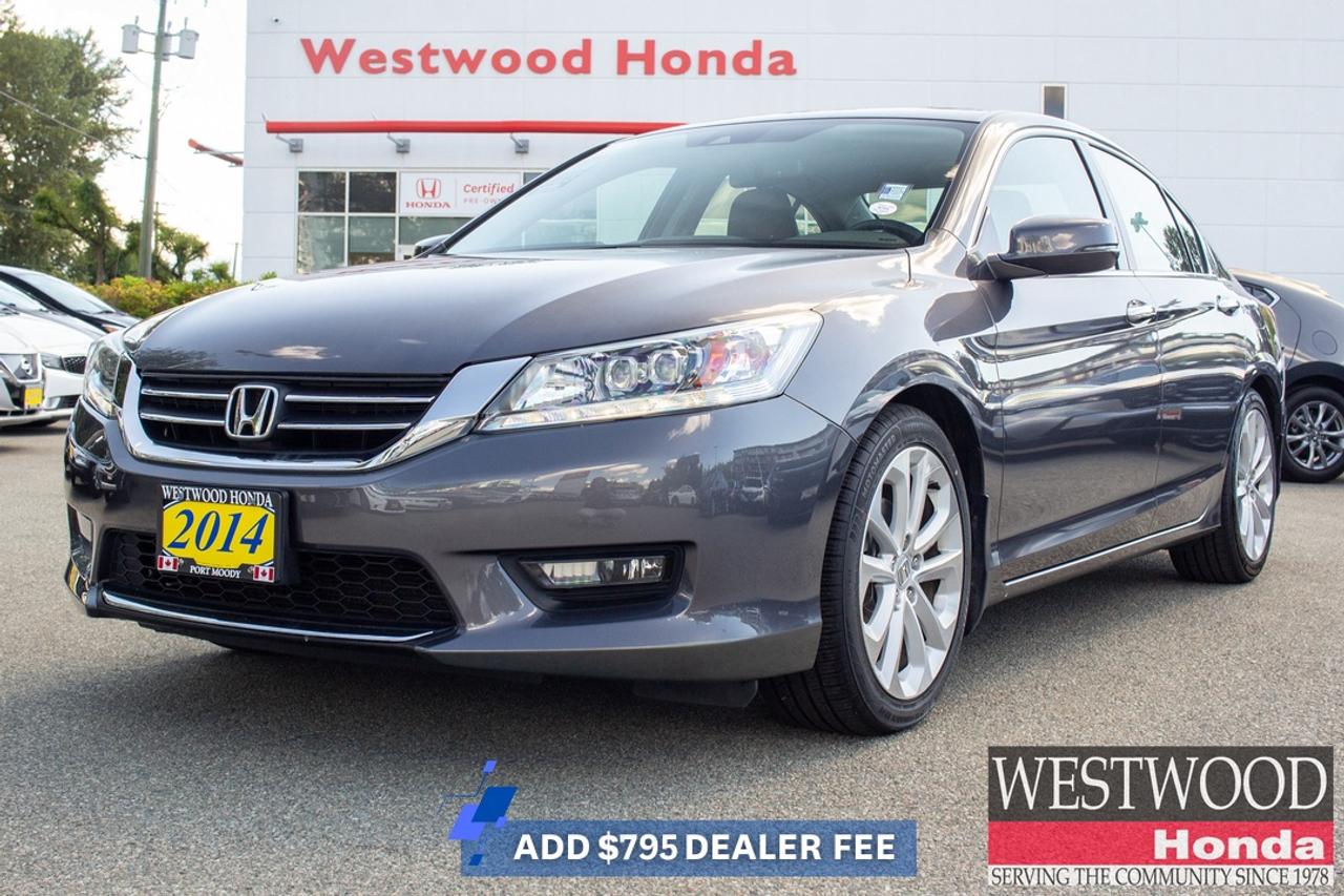 2014 Honda Accord Touring Premium Comfort and Touring-Level RefinementThe 2014 Honda Accord Touring delivers a sophisticated driving experience with premium features, impressive comfort, and Hondas reputation for long-term reliability. Whether youre commuting through Coquitlam, Burnaby, or Vancouver, this flagship Accord sedan offers an elevated ownership experience with upscale amenities and confident road manners.### Key highlights include:* Touring trim upgrades* Leather-trimmed seating* Navigation system* Power sunroof* Heated front and rear seats* Premium audio system* Forward Collision Warning and Lane Departure Warning* Dual-zone automatic climate controlInside, the Accord Touring provides a refined cabin designed for everyday comfort. Premium materials, generous passenger space, and thoughtful technology features make every drive more enjoyable, whether youre navigating Metro Vancouver traffic or heading out on a BC road trip.Hondas efficient engineering and smooth ride quality help make the Accord a favourite among drivers seeking comfort, reliability, and long-term value. The spacious trunk and roomy rear seating also make it well-suited for families, professionals, and commuters alike.At Westwood Honda in Port Moody, every pre-owned vehicle is backed by our **BuySmart Program**, including a **Full CarProof vehicle history report**, **Mechanical inspection**, **2-month / 5,000km powertrain warranty**, **6-month tire, brake, battery, and bulb coverage**, **Professional detailing**, **Full tank of gas**, and **Market-based no-haggle pricing**. As a trusted Tri-Cities dealership serving Port Moody, Coquitlam, Port Coquitlam, and Metro Vancouver, Westwood Honda offers a transparent, customer-first purchase experience with financing, trade-in, and test-drive support.**Book your test drive today.****Apply for financing online today.****Reserve this Accord Touring before its gone.**## FAQs**Q: Is the 2014 Honda Accord Touring good for Metro Vancouver commuting?**A: Yes. Its comfortable ride, premium features, and efficient performance make daily commuting enjoyable.**Q: Does the Accord Touring have leather seats?**A: Yes. The Touring trim includes leather-trimmed seating surfaces for added comfort and premium appeal.**Q: Is this Accord suitable for BC highway travel?**A: Absolutely. The spacious cabin and comfortable ride make it ideal for longer trips throughout British Columbia.**Q: How much cargo space does the Accord offer?**A: The Accord sedan provides a large trunk that easily accommodates luggage, groceries, and everyday gear.**Q: Can I trade in my current vehicle at Westwood Honda?**A: Yes. Westwood Honda accepts trade-ins and can apply the value toward your next vehicle purchase.**Q: Are financing options available for used vehicles?**A: Yes. Westwood Honda offers financing solutions tailored to a variety of credit situations across Metro Vancouver.