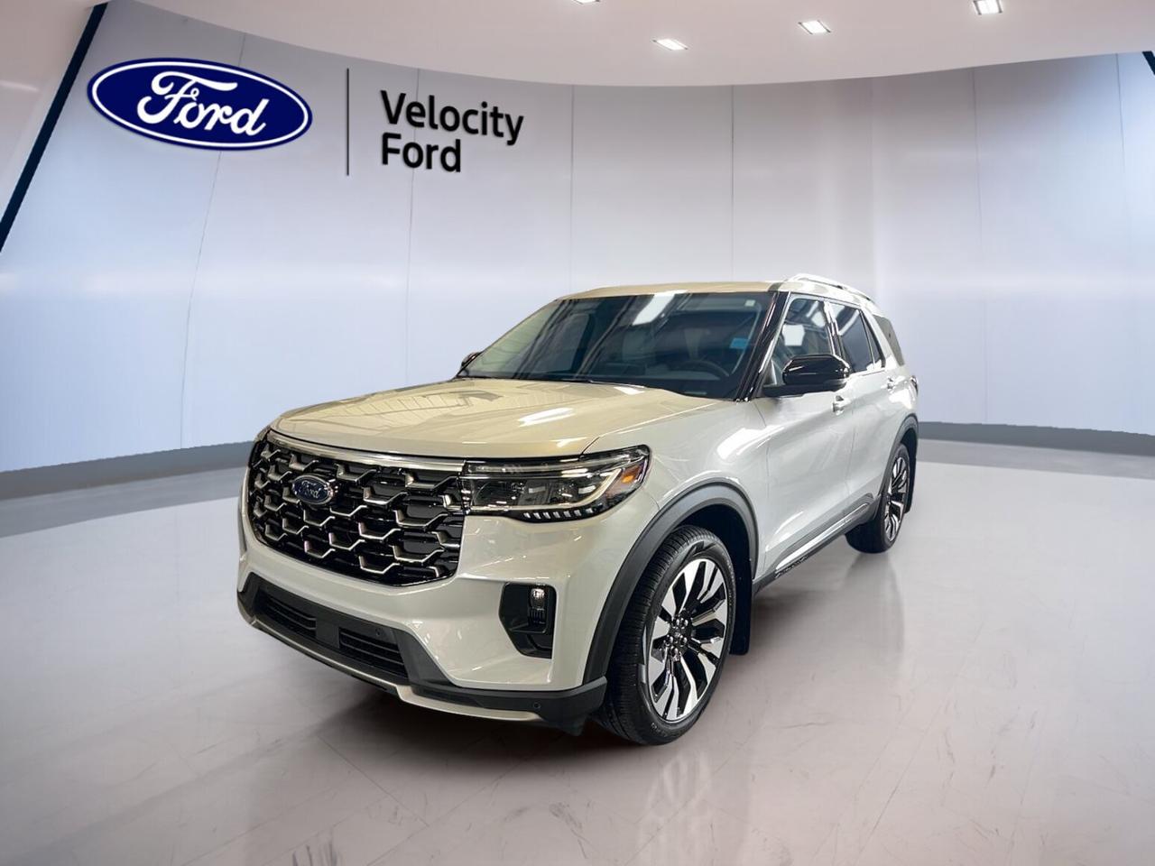 Discover refined capability in the brand new 2026 Ford Explorer Platinum 4WD at Velocity Ford in Moose Jaw. Finished in White with a Grey interior, this four-door SUV blends upscale comfort with confident all-weather traction. Its 2.3-litre unleaded engine and automatic transmission deliver smooth power for daily driving and weekend travel.

The 2026 Ford Explorer Platinum 4WD gives you the premium feel many drivers want, paired with practical features that matter in real life. This new SUV includes a glass sunroof, navigation system, heated front and rear seats, power liftgate, backup camera, and advanced driver-assist features for added confidence on busy roads.

FEATURES OF THE Explorer Platinum 4WD

»» White exterior with refined premium presence
»» Grey interior with upscale cabin feel
»» Glass sunroof brings in natural light
»» Four-wheel drive for year-round confidence

ADVANCED SAFETY FEATURES

»» Backup camera helps with reverse visibility
»» Lane departure warning adds highway confidence
»» Blind spot monitor supports safer lane changes
»» Side and head airbags enhance protection

PERFORMANCE AND EFFICIENCY

»» 2.3-litre unleaded engine balances power efficiently
»» Automatic transmission delivers smooth daily operation
»» Four-wheel drive improves traction on slick roads
»» Cruise control supports relaxed highway driving

COMFORT AND CONVENIENCE

»» Heated front seats add cold-weather comfort
»» Heated rear seats help keep passengers cozy
»» Dual-zone climate control improves cabin comfort
»» Remote starter adds everyday convenience

TECHNOLOGY AND CONNECTIVITY

»» Navigation system helps guide every trip
»» Bluetooth integration supports hands-free mobile use
»» WiFi hotspot keeps devices better connected
»» Steering wheel audio controls ease operation

CARGO SPACE

»» Power liftgate makes loading easier daily
»» Rear trunk access simplifies cargo handling
»» Four-door layout supports family-friendly practicality
»» SUV design offers versatile storage flexibility

WHAT OTHER OWNERS LIKE

»» Comfortable ride quality for daily travel
»» Easy-to-use infotainment and clear controls
»» Helpful driver-assist features inspire confidence
»» Spacious cabin suits families and gear

Inside, the 2026 Ford Explorer Platinum 4WD is designed to make every drive feel easier. Memory seats, a power drivers seat, power passenger seat, lumbar support for both front occupants, automatic climate control, rear climate control, and ambient lighting all help create a polished and welcoming cabin environment.

This SUV also brings useful exterior details that add convenience and style. Heated mirrors, electric mirrors, retractable mirrors, turn signal mirrors, automatic headlights, LED headlamps, fog lights, tinted windows, rear spoiler, and a rear window defroster all support comfort and visibility through changing Prairie conditions.

Entertainment and information are easy to access in the 2026 Ford Explorer Platinum 4WD. Satellite radio, HD Radio, Bluetooth integration, WiFi hotspot, and steering wheel audio controls help keep every drive connected. Push-button start and an auto-dimming rearview mirror add smart touches that drivers appreciate every day.

For peace of mind, this new model also includes anti-lock braking system, stability control, tire pressure monitoring, child safety locks, passenger airbag sensor, driver airbag, passenger airbag, and side impact airbags. At Velocity Ford in Moose Jaw, this brand new 2026 Ford Explorer Platinum 4WD is ready to deliver premium comfort, modern technology, and confident four-wheel-drive capability.

This 2026 Ford Explorer Platinum 4WDs VIN is: 1FMUK8HH4TGB85343.