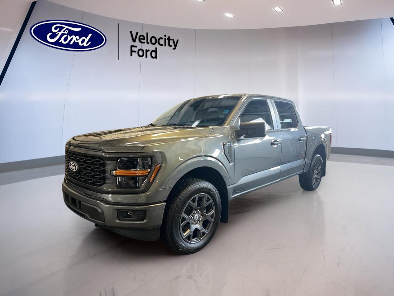 Get ready for hard-working capability and everyday comfort in the brand new 2026 Ford F-150 STX 4WD SuperCrew 5.5 Box, now at Velocity Ford in Moose Jaw. Finished in Grey with a Black interior, this four-door truck blends proven utility, modern safety, and smart tech for drivers who need a pickup that fits workdays, weekends, and everything in between.

Built with a 2.7-litre unleaded engine and automatic transmission, this new 2026 Ford F-150 STX 4WD SuperCrew 5.5 Box delivers confident power with smooth shifting and the added traction of four-wheel drive. Off-road tires, a rear tow hook, and a 4,671 kg towing capacity help this truck handle demanding tasks while keeping daily driving easy and controlled.

FEATURES OF THE F-150 STX 4WD SuperCrew 5.5 Box
»» Bold STX appearance with practical crew cab
»» Short 5.5-foot box for easy loading
»» Four-wheel drive for added year-round traction
»» Automatic transmission with dual shift mode

TRUCK FEATURES
»» Tows up to 4,671 kg confidently
»» Rear tow hook supports truck utility
»» Off-road tires add grip on rough terrain
»» SuperCrew cab adds passenger-friendly truck versatility

ADVANCED SAFETY FEATURES
»» Backup camera helps with reversing confidence
»» Lane departure warning supports safer travel
»» Blind spot monitor boosts lane awareness
»» Side and head airbags add protection

PERFORMANCE AND EFFICIENCY
»» 2.7-litre unleaded engine balances power efficiently
»» Automatic transmission delivers smooth daily shifting
»» Four-wheel drive supports traction in tough conditions
»» Stability control helps maintain composed handling

COMFORT AND CONVENIENCE
»» Front air conditioning keeps cabin comfortable
»» Cruise control supports relaxed highway driving
»» Power windows add everyday ease
»» Driver lumbar support improves long-drive comfort

TECHNOLOGY AND CONNECTIVITY
»» Bluetooth integration supports hands-free communication
»» WiFi hotspot keeps passengers better connected
»» Satellite radio expands entertainment choices
»» Steering wheel audio controls simplify access

CARGO SPACE
»» 5.5-foot box supports versatile hauling needs
»» Rear trunk access helps everyday loading
»» Spare tire adds peace of mind
»» Four-door cab supports gear and passengers

WHAT OTHER OWNERS LIKE
»» Strong towing ability for work and play
»» User-friendly technology for everyday convenience
»» Comfortable cabin for family and crew
»» Confident four-wheel drive in changing weather

This brand new pickup is well equipped with practical features drivers want most. Anti-Lock Braking System, power steering, child safety locks, heated mirrors, electric mirrors, tinted windows, automatic headlights, tire pressure monitoring, passenger airbag sensor, illuminated passenger vanity mirror, rear window defroster, automatic door locks, and LED headlamps all add value to this capable truck.

The Grey exterior gives this truck a clean, modern look, while the Black interior keeps the cabin simple and durable. With a roomy SuperCrew layout, four doors, and useful convenience features throughout, this 2026 Ford F-150 STX 4WD SuperCrew 5.5 Box is ready to support busy families, active lifestyles, and jobsite demands with equal ease.

Find this new Ford pickup today at Velocity Ford in Moose Jaw and discover a truck designed to deliver real-world capability without overcomplicating the drive. From towing and traction to comfort and connectivity, this F-150 is ready to get to work.

This 2026 Ford F-150 STX 4WD SuperCrew 5.5 Boxs VIN is: 1FTEW2LP5TKE16773.