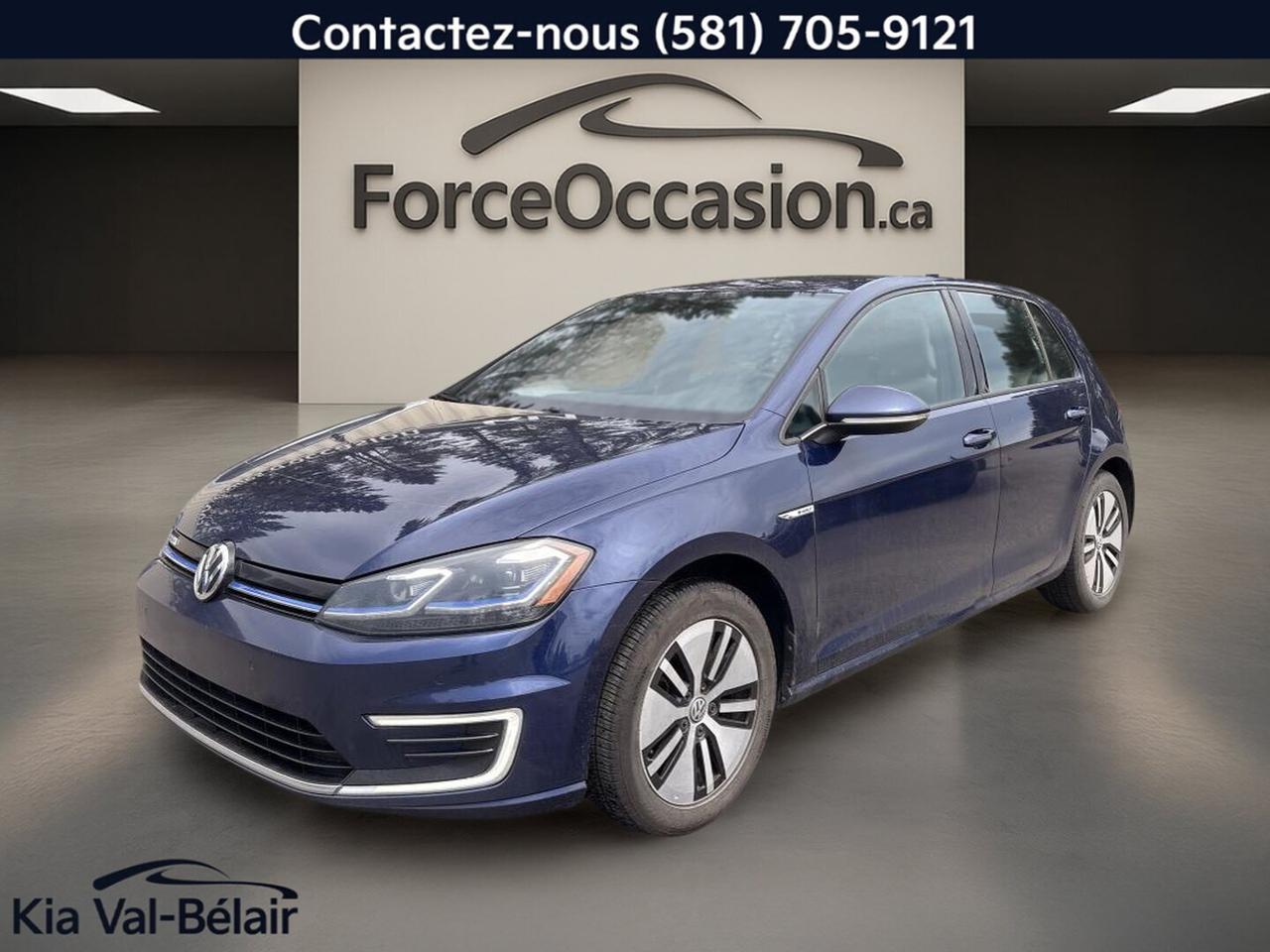 très propres // Inspecté en 135 points

La Volkswagen e-Golf 2020 COMFRONTLINE offerte chez Kia Val-Bélair à Québec est une berline 100% électrique à 4 portes, pratique et discrète. Finie en bleu avec intérieur noir, elle affiche 106 163 km, une transmission automatique et un rouage avant bien adapté aux trajets quotidiens.

CARACTÉRISTIQUES DE SÉCURITÉ AVANCÉES
»» Caméra de recul pour manoeuvres simplifiées
»» Freins antiblocage avec contrôle de stabilité
»» Coussins gonflables latéraux et latéraux de tête
»» Serrures de sécurité enfant et surveillance des pneus

CARACTÉRISTIQUES DU VÉHICULE ÉLECTRIQUE
»» Motorisation 100% électrique sans essence
»» Autonomie EPA estimée à 201 km
»» Batterie lithium-ion de 35,8 kWh
»» Recharge sur borne 240 volts compatible

PERFORMANCE ET EFFICACITÉ
»» Transmission automatique à réponse fluide
»» Traction avant pour conduite prévisible
»» Différentiel à glissement limité inclus
»» Conduite silencieuse propre à lélectrique

CONFORT
»» Sièges avant chauffants pour lhiver
»» Siège conducteur à réglage électrique
»» Siège passager à réglage électrique
»» Climatisation automatique à deux zones

TECHNOLOGIE ET CONNECTIVITÉ
»» Intégration Bluetooth pour appels et audio
»» Commandes audio pratiques au volant
»» Démarrage par bouton-poussoir de série
»» Radio satellite et phares automatiques

ESPACE DE CHARGEMENT
»» Hayon arrière pratique pour le chargement
»» Couvre-bagage inclus pour plus de discrétion
»» Banquette arrière utile au quotidien
»» Format de berline polyvalent à 4 portes

APPRÉCIÉ DES AUTRES PROPRIÉTAIRES
»» Conduite douce et silencieuse en ville
»» Format compact facile à stationner
»» Habitacle simple et ergonomique
»» Coûts dutilisation réduits sans carburant

GARANTIE
»» Garantie légale seulement
»» Garantie dusage
»» Garantie de durée raisonnable
»» Garantie contre les vices cachés

Cette Volkswagen e-Golf 2020 COMFRONTLINE mise sur des éléments concrets et utiles au quotidien. On y retrouve des rétroviseurs chauffants et électriques, des vitres électriques, un volant réglable gainé de cuir, un rétroviseur intérieur électrochromatique, ainsi quun dégivreur de vitre arrière pour faciliter lusage en saison froide.

Son format de berline électrique convient bien à la circulation urbaine de Québec, tout en offrant une conduite stable sur route grâce à la direction assistée, au régulateur de vitesse et aux pneus haute performance. Le rouage avant et le contrôle de stabilité contribuent aussi à un comportement rassurant dans diverses conditions.

À bord, lambiance est soignée avec un pack déclairage ambiant, des miroirs de courtoisie éclairés à lavant, des supports lombaires pour le conducteur et le passager, ainsi quun accès pratique au coffre arrière. Les phares à DEL et laileron arrière complètent une présentation sobre et moderne.

Pour un acheteur qui recherche un véhicule 100% électrique usagé, bien équipé et facile à vivre, cette Volkswagen e-Golf 2020 COMFRONTLINE représente une option sérieuse. Elle réunit des équipements recherchés, une autonomie connue de 201 km selon lEPA et une présentation élégante dans une carrosserie bleue distinctive.

Le NIV de ce Volkswagen e-Golf COMFRONTLINE 2020 est le WVWPR7AUXLW909668 .

Garantie prolongée disponible, livraison en 48h