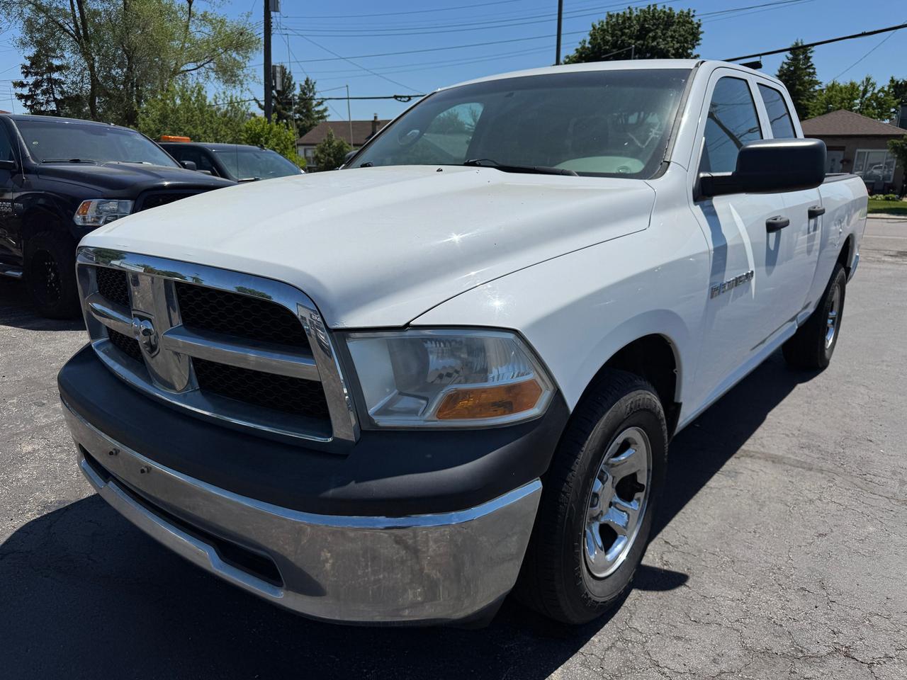 <p class=p1>✅ Certified | <span class=s2><strong>2012 Ram 1500 ST | Quad Cab</strong></span></p><p class=p2>&nbsp;</p><p class=p2>This Certified 2012 Ram 1500 ST is a dependable full-size pickup offering strong capability, a spacious Quad Cab interior, and proven durability &mdash; perfect for work, hauling, or everyday driving.</p><p class=p2>&nbsp;</p><p class=p2>🔹 <span class=s2><strong>4.7L V8 Engine</strong></span><br>🔹 Automatic Transmission<br>🔹 <span class=s2><strong>Quad Cab &mdash; Extended Four-Door Configuration</strong></span><br>🔹 ST Trim<br>🔹 Cloth Interior &mdash; Clean & Comfortable<br>🔹 Air Conditioning<br>🔹 Cruise Control<br>🔹 Power Windows, Locks & Mirrors<br>🔹 AM/FM/CD Audio System<br>🔹 Trailer Hitch<br>🔹 Spacious Pickup Bed<br>🔹 Traction Control & ABS<br>🔹 Runs and Drives Excellent</p><p class=p2>&nbsp;</p><p class=p2>📍 Visit Us:<br>74 Parkdale Avenue North, Hamilton, Ontario</p><p class=p2>&nbsp;</p><p class=p2>📞 Call or Text:<br>(905) 975-9705 / (905) 462-5542</p><p class=p2>&nbsp;</p><p class=p2>📧 Email:<br>gusmarkos@gmail.com</p><p class=p2>&nbsp;</p><p class=p2>🗓️ Test Drives by Appointment Only &mdash; Book Yours Today</p><p class=p2>&nbsp;</p><p class=p2>🛡️ Buy With Confidence &mdash; OMVIC Licensed Dealership<br>✔️ CARFAX VERIFIED &mdash; Full History & Lien-Free<br>✔️ No Hidden Fees &mdash; Just Price + HST + Licensing<br>✔️ Trade-Ins Welcome &mdash; Top Dollar for Your Vehicle<br>✔️ Don&rsquo;t See What You Want? We&rsquo;ll Find It for You</p><p class=p2>&nbsp;</p><p class=p2>💻 100% Online Purchase Available &mdash; Financing & Delivery Options<br>🚗 Ontario-Wide Delivery Available<br>✈️ Ask About Our Customer Travel Program</p>