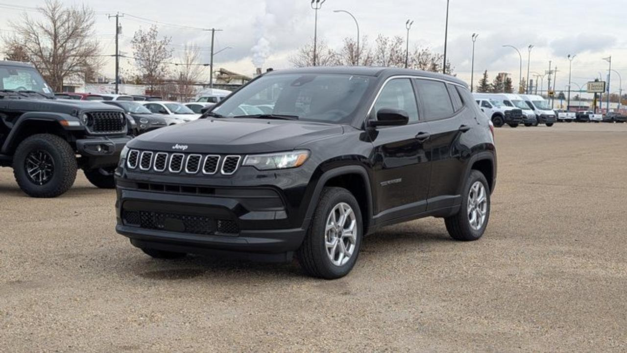 The 2026 Jeep Compass Sport is a stylish and capable compact SUV, designed for both city driving and weekend adventures. Finished in Diamond Black Crystal Pearl with a Black interior, it offers a bold, modern appearance. Powered by a 2.0L Turbo engine paired with an 8-speed automatic transmission, the Compass Sport delivers smooth, responsive performance and a confident ride. Inside, bucket seats and heated front seats provide comfort, while the premium sound system keeps every drive enjoyable. Safety features including lane departure warning, lane keep assist, and a backup camera help provide peace of mind. Additional features such as automatic LED headlamps, cruise control, and traction control enhance convenience and control, making the 2026 Jeep Compass Sport a versatile and reliable choice for drivers seeking style, comfort, and capability. VISIT US TODAY! Ask for the Internet Department for more information or to book your test drive today! Text 587-772-2566 for a quicker response! AMVIC Licensed Dealer - License Number B2039062. Disclaimer: All prices are plus taxes and include all cash credits. See dealer for details. Stop by and visit us at THE ALL-NEW DERRICK DODGE, 6211 104 ST NW, EDMONTON, AB, T6H2K8.