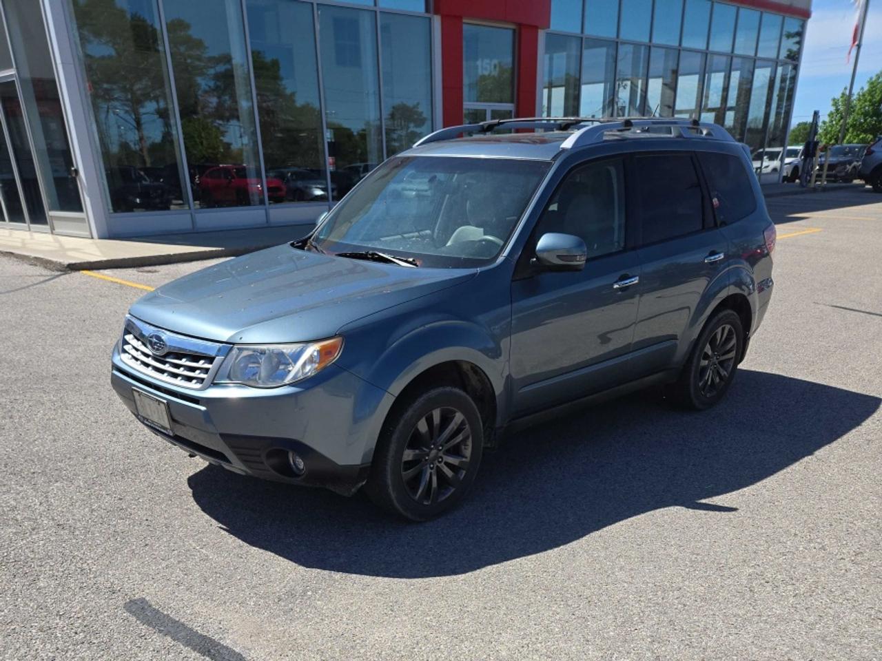** ** SPECIAL LIMITED TIME OFFER ** ** PURCHASE ANY VEHICLE THIS WEEK AND RECEIVE 4 BRAND-NEW ALL-SEASON TIRES AT NO ADDITIONAL COST!!! DON   T MISS THIS EXCLUSIVE CHANCE TO UPGRADE YOUR RIDE AND STAY PREPARED FOR ANY WEATHER!!! <br><br>EXCITING NEWS FROM FIRST CHOICE MOTORS! Our brand-new online showroom is now open to the public, bringing the ultimate car shopping experience right to your fingertips! Enjoy a 100% online car shopping experience, with over 500 certified vehicles in stock, comprehensive protection plans, and thousands of new auto parts & accessories available! Plus, for a limited time, were offering FREE deliveries across Ontario on all vehicle purchases! Dont miss out   visit Shop.fcmotors.ca to find and upgrade your perfect vehicle today!<br><br>Welcome to First Choice Motors, the largest car dealership in Toronto of pre-owned cars, SUVs, and vans priced between $5000-$15,000. With an impressive inventory of over 300 vehicles in stock, we are dedicated to providing our customers with a vast selection of affordable and reliable options. <br><br>Were thrilled to offer a used 2013 Subaru Forester X Touring, blue color with 128,000km (STK#9977) This vehicle was $8490 NOW ON SALE FOR $7990. It is equipped with the following features:<br>- Automatic Transmission<br>- Sunroof<br>- Heated seats<br>- All wheel drive<br>- Alloy wheels<br>- Power windows<br>- Power locks<br>- Power mirrors<br>- Air Conditioning<br><br>At First Choice Motors, we believe in providing quality vehicles that our customers can depend on. All our vehicles come with a 36-day guarantee on all safety related items. We also offer additional warranty options up to 5 years for our customers who want extra peace of mind.<br><br>Furthermore, all our vehicles are sold fully certified with brand new brakes rotors and pads, a fresh oil change, and brand new set of all-season tires installed & balanced. You can be confident that this car is in excellent condition and ready to hit the road.<br><br>At First Choice Motors, we believe that everyone deserves a chance to own a reliable and affordable vehicle. Thats why we offer financing options with low interest rates starting at 7.9% O.A.C. Were proud to approve all customers, including those with bad credit, no credit, students, and even 9 socials. Our finance team is dedicated to finding the best financing option for you and making the car buying process as smooth and stress-free as possible.<br><br>Our dealership is open 7 days a week to provide you with the best customer service possible. We carry the largest selection of used vehicles for sale under $9990 in all of Ontario. We stock over 300 cars, mostly Hyundai, Chevrolet, Mazda, Honda, Volkswagen, Toyota, Ford, Dodge, Kia, Mitsubishi, Acura, Lexus, and more. With our ongoing sale, you can find your dream car at a price you can afford. Come visit us today and experience why we are the best choice for your next used car purchase!<br><br>All prices include $22.00 OMVIC Fee.  Excludes, license plates, ownership registration and ONTARIO HST (13%)<br>*No Credit Card payments can be accepted for Vehicle Purchases*